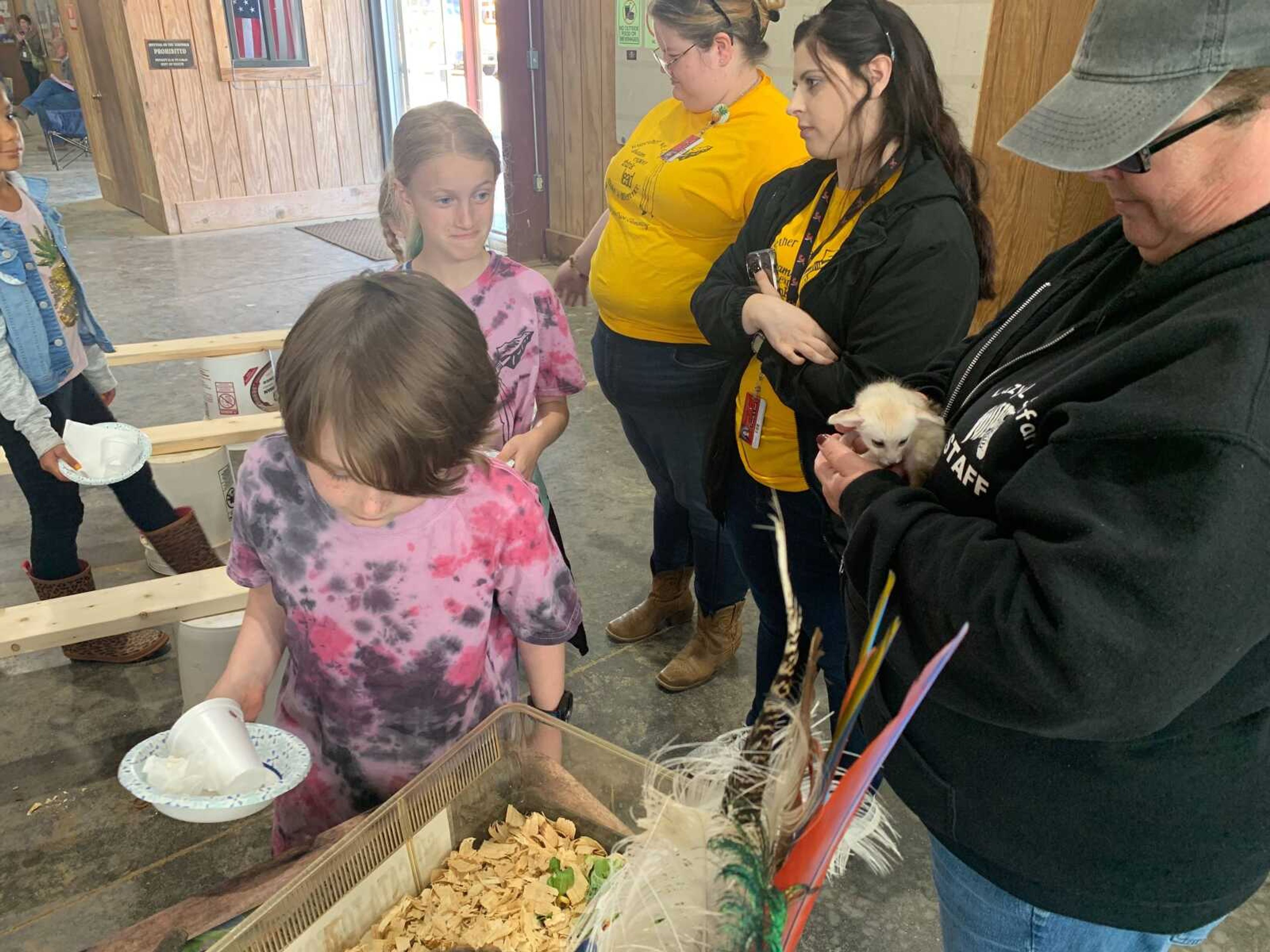 Orchard Elementary students take a snack break while learning about Agri Tourism and looking at Fennec foxes and a turtle. Fennec foxes are the smallest of all canids and are native to Africa and Arabia.