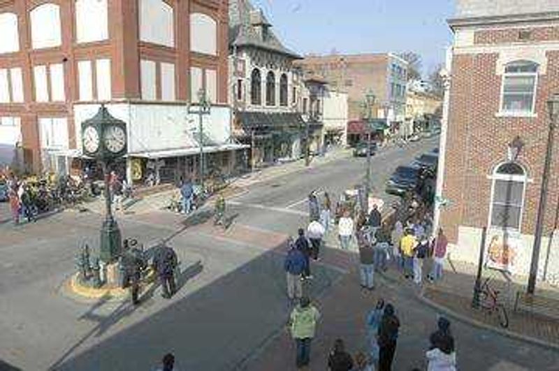 Extras wait along Main Street for directions during the January 2006 filming. (Diane L. Wilson)