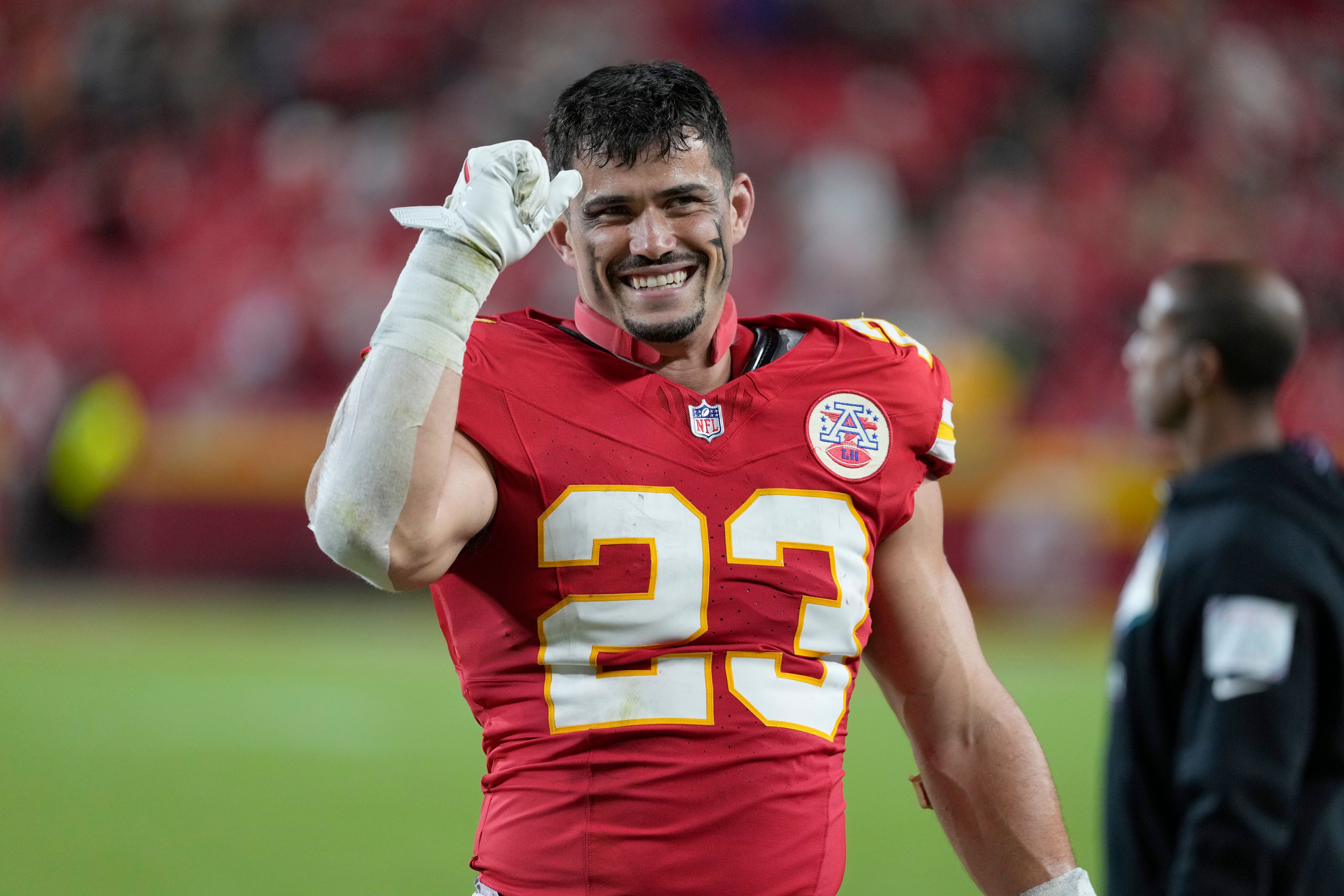 Kansas City Chiefs linebacker Drue Tranquill (23) celebrates near the end of an NFL football game against the New Orleans Saints Monday, Oct. 7, 2024, in Kansas City, Mo. (AP Photo/Ed Zurga)