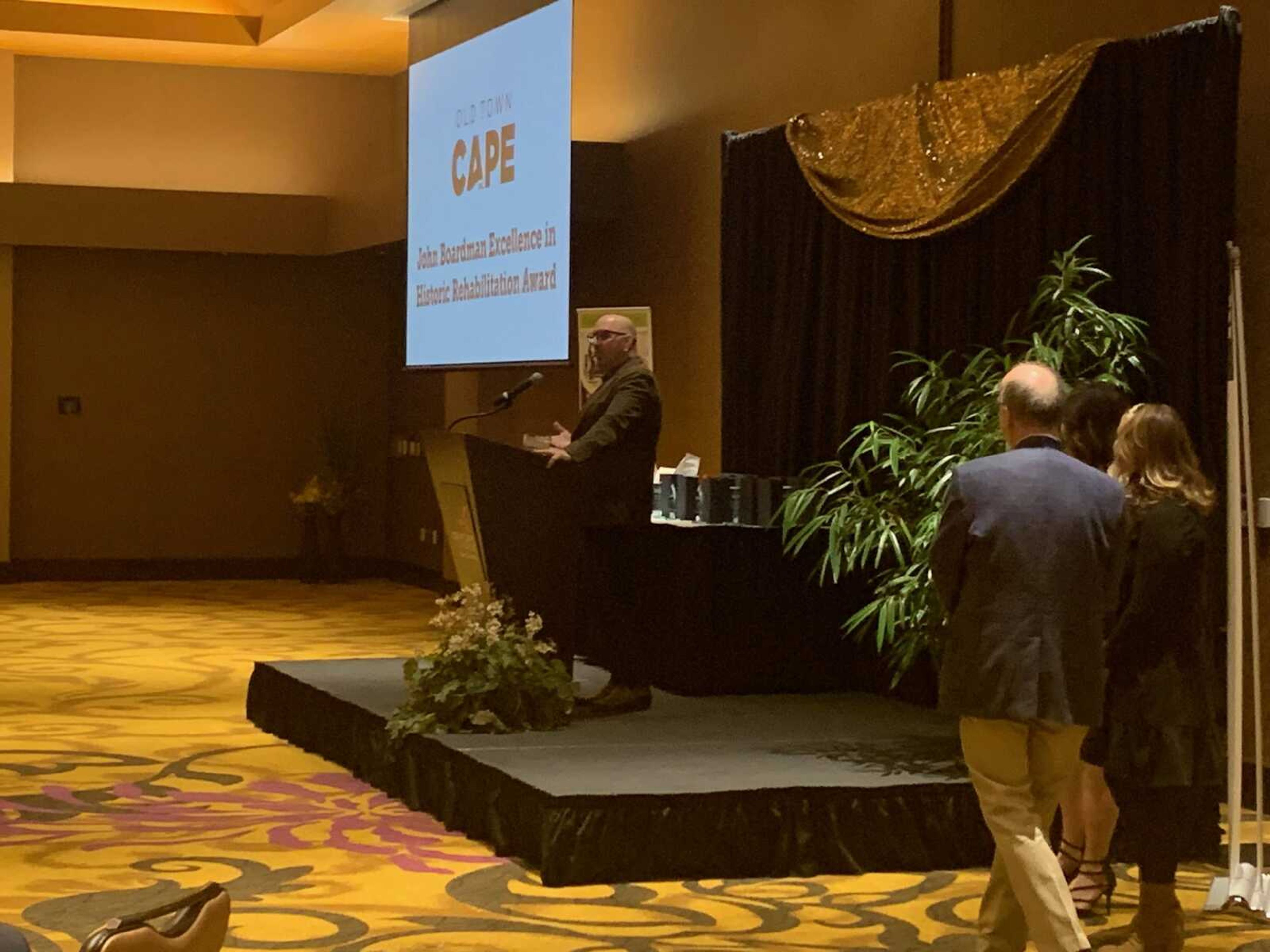 Steve Watkins speaks to the crowd after being presented with the 'Excellence in Historic Preservation'. Watkins owns a business called 'The Forge' where people can learn blacksmithing skills and the location also acts as a wedding venue.