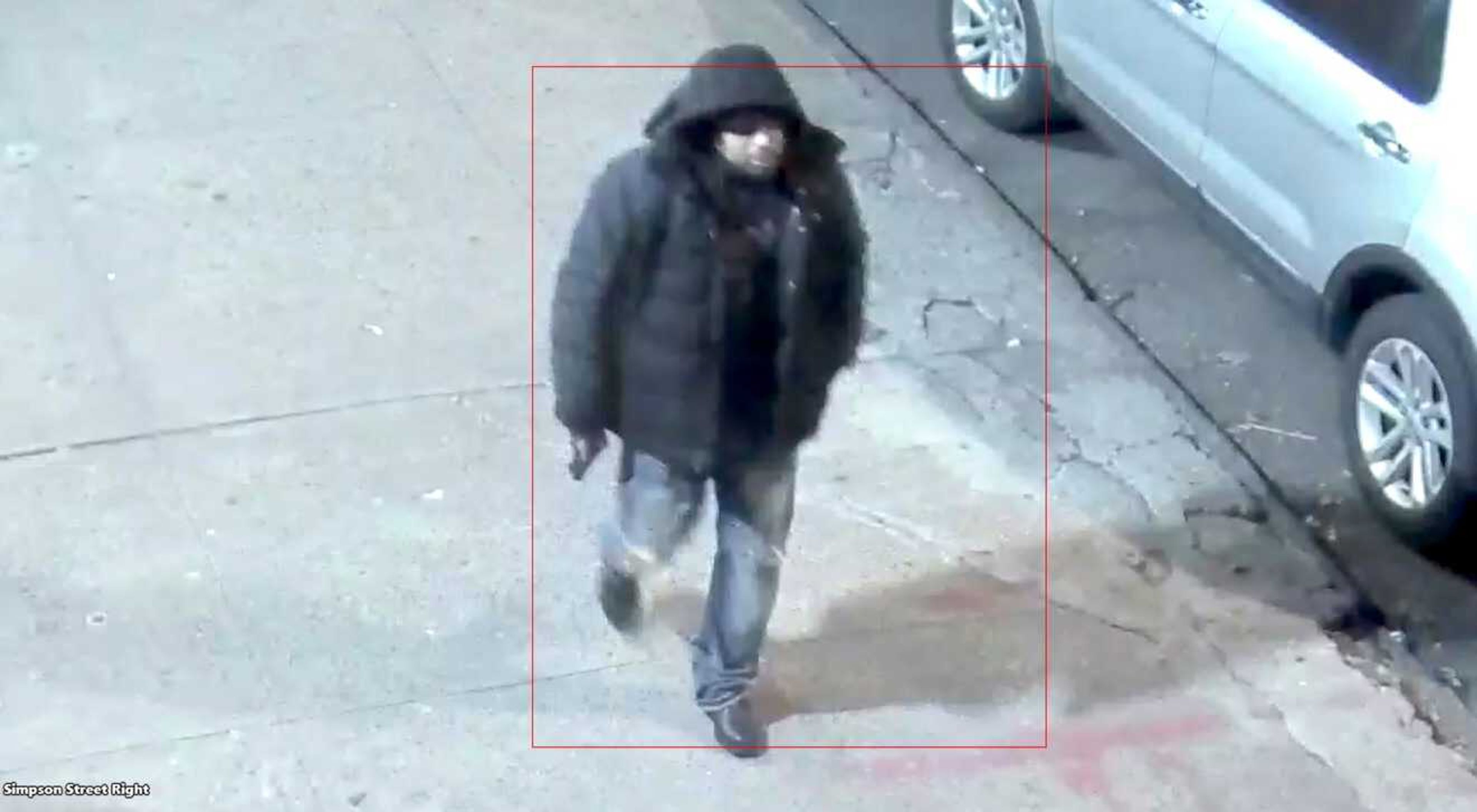 In this image taken from video, a man, who the NYPD is seeking the public's assistance in identifying in connection to a police involved shooting, walks down a street Saturday in New York.