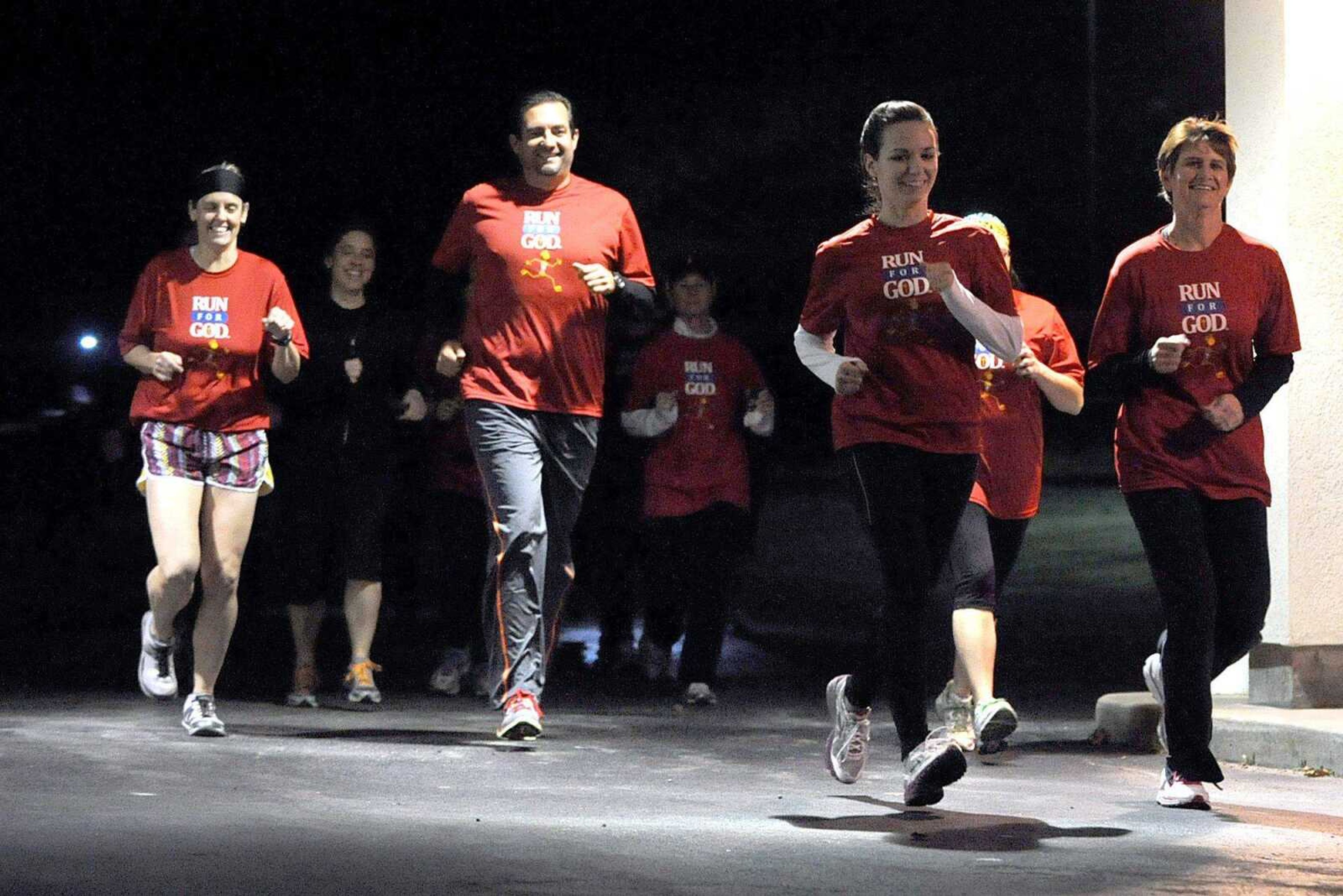 Runners training with the Run for God group make a lap around Lynwood Baptist Church on Nov. 19 in Cape Girardeau. (Laura Simon)