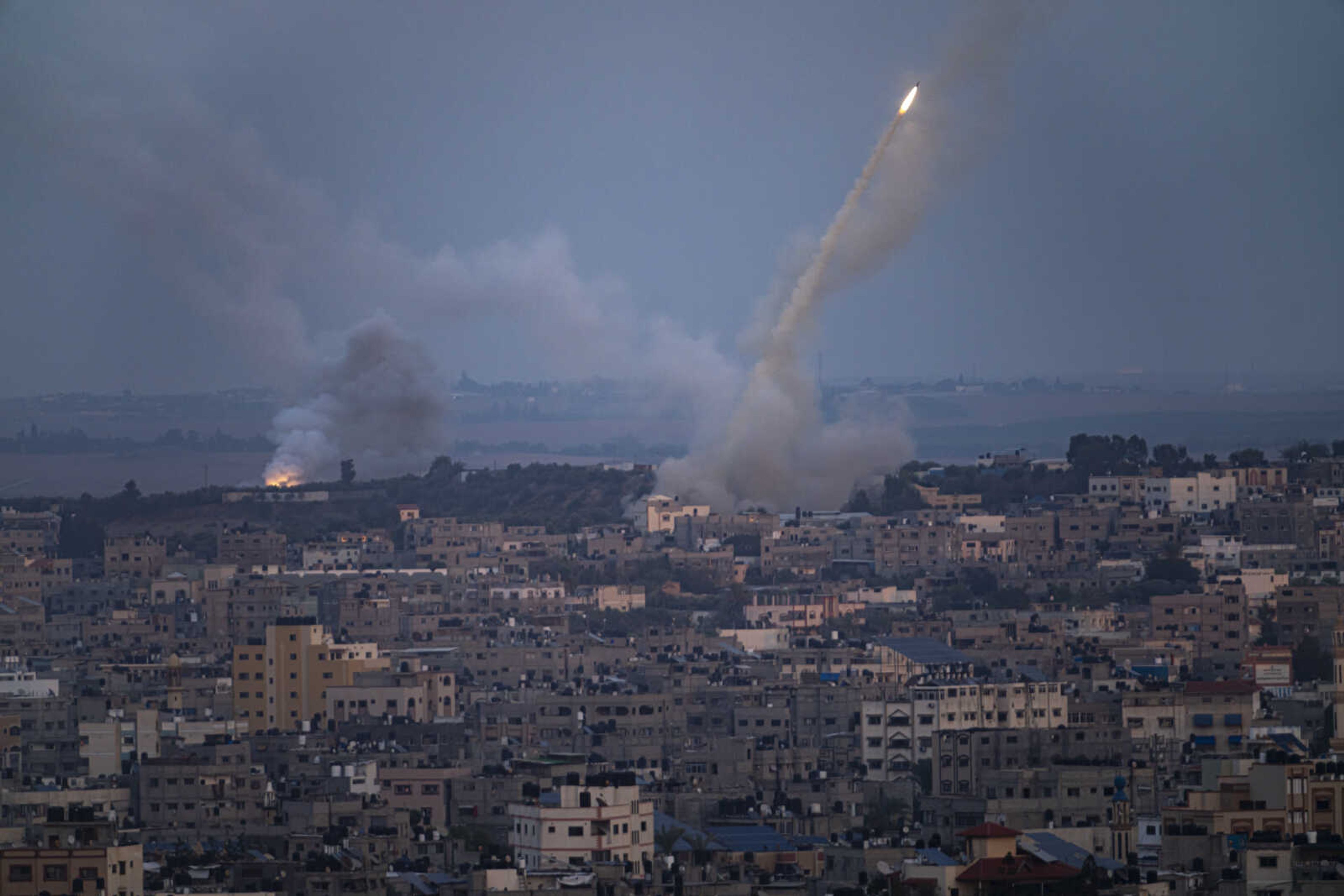 Rockets are fired toward Israel from the Gaza Strip, Wednesday, Oct. 11, 2023. (AP Photo/Fatima Shbair)