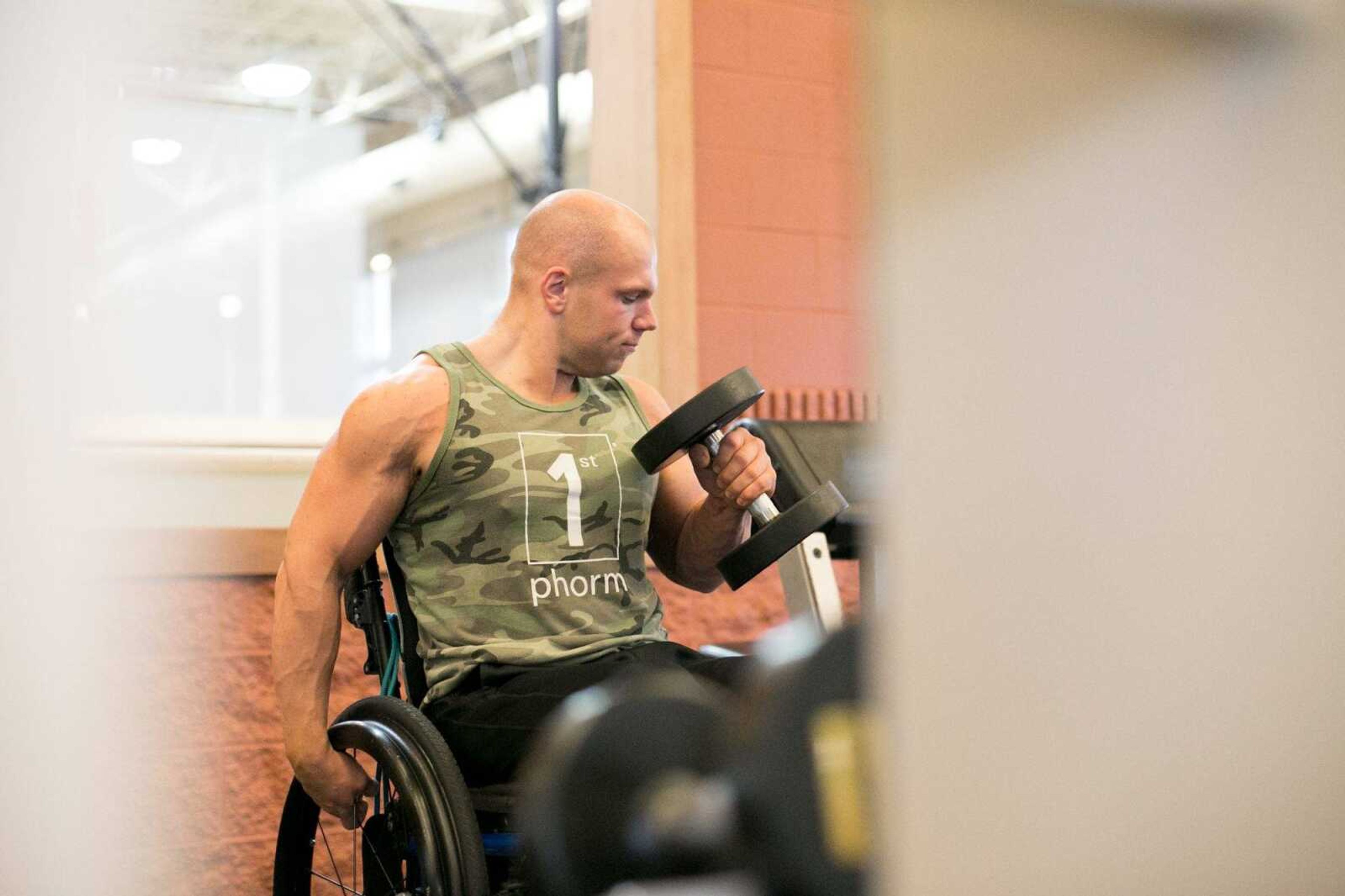 Brandon Strop moves through his workout routine at HealthPoint Fitness Tuesday, Sept. 29, 2015 in Cape Girardeau. (Glenn Landberg)