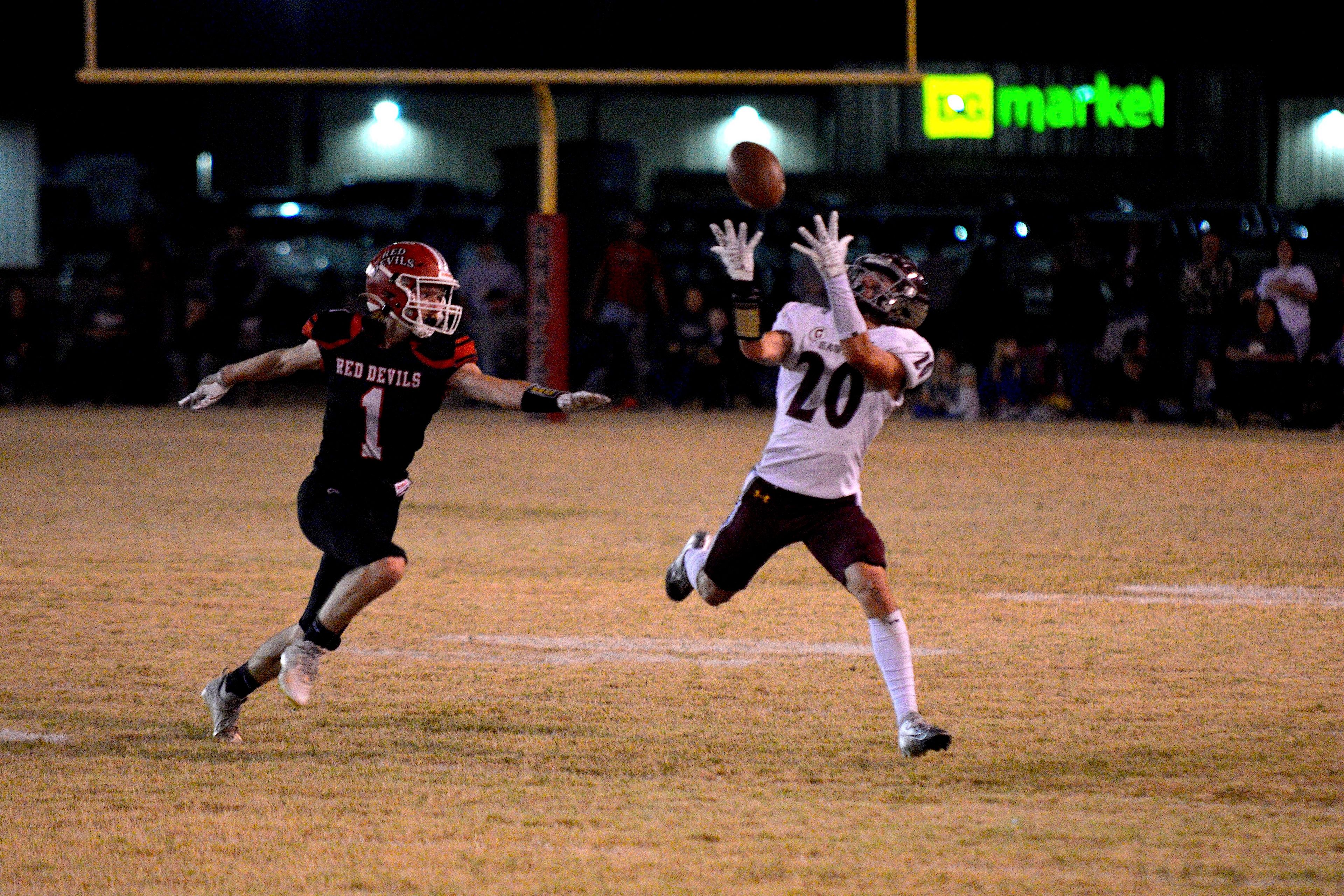 Kelly receiver Grant Burleson catches a pass against Chaffee on Friday, Oct. 25, in Chaffee.