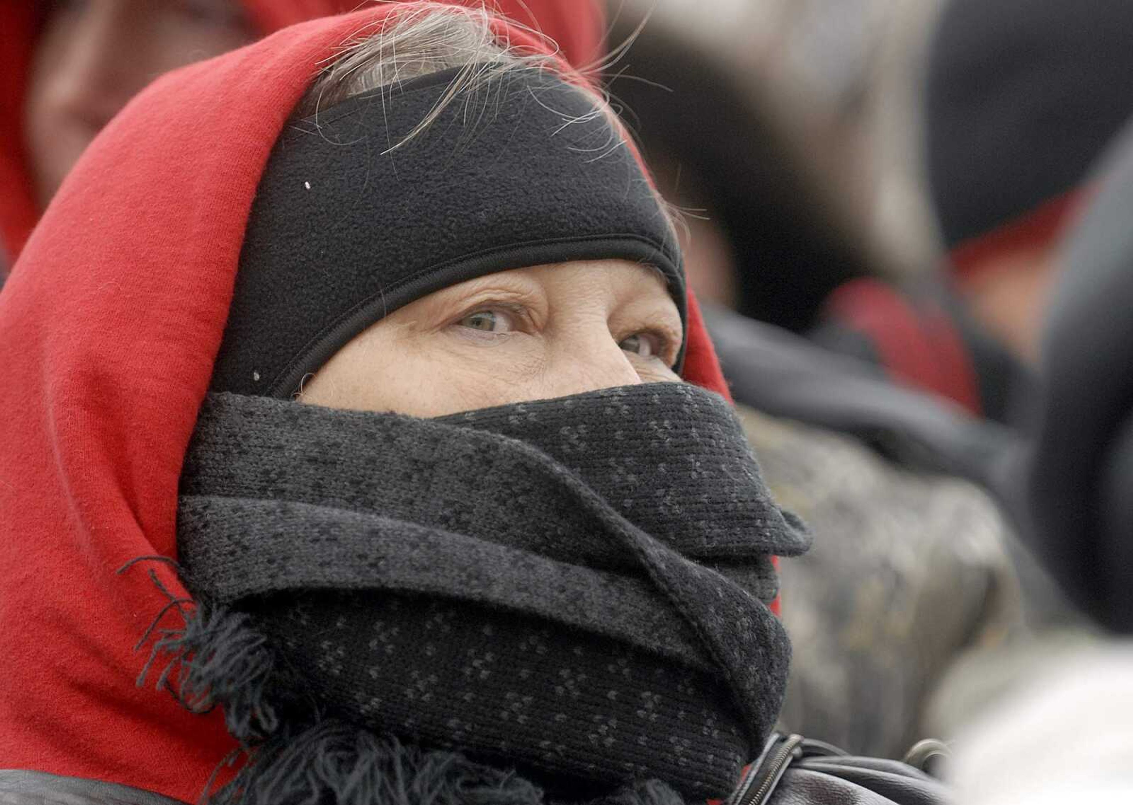 ELIZABETH DODD ~ edodd@semissourian.com
Nancy Markhart, grandmother of Jackson's Jake Wolpers, bundles up before the start of the game.