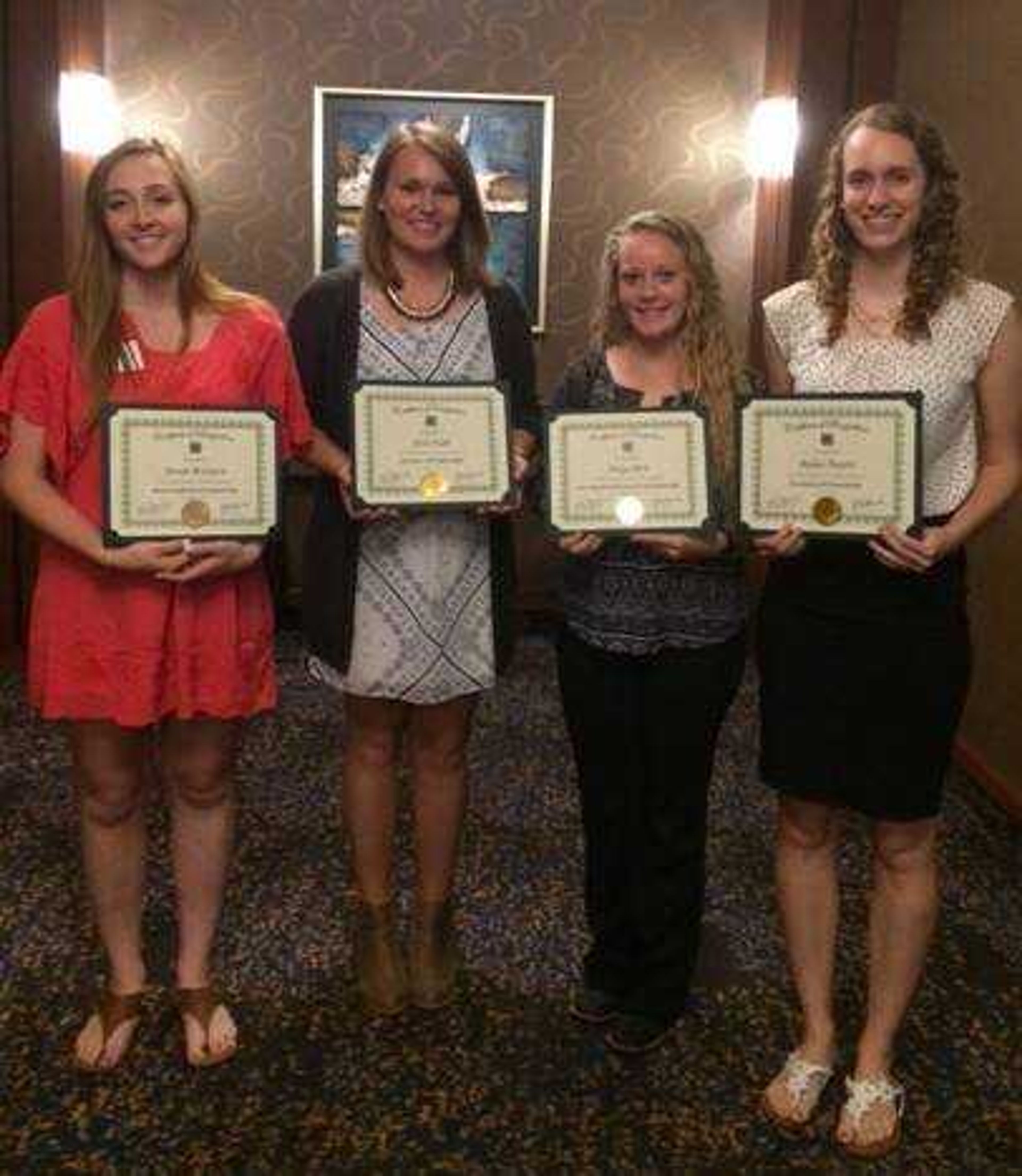 Wichern, Todt, Birk, and Peters with their Scholarship Awards on October 7, 2016.