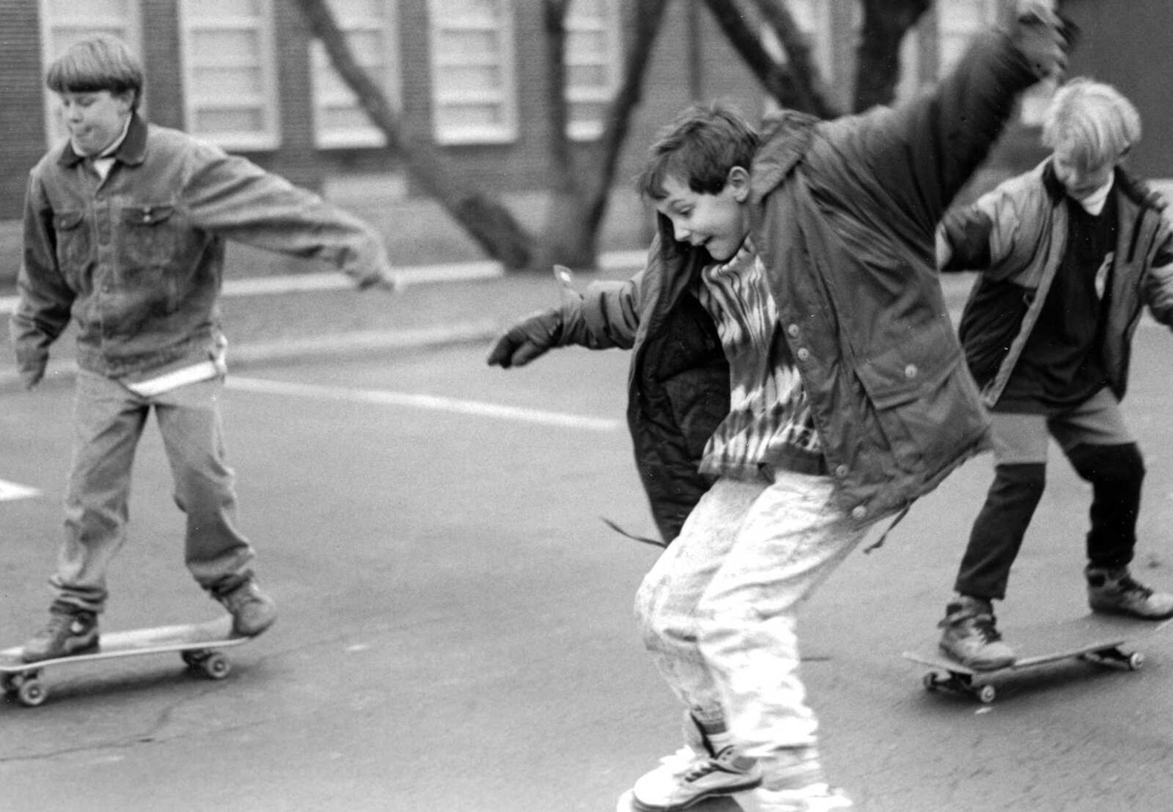 Published Jan. 11, 1993.
Even with temperatures in the low 30s Sunday afternoon, from left, Jesse Mason, 10, Johnathon Thompson and Travis Wissman, both 9, did not seem to notice. (Larry Thompson ~ Southeast Missourian archive)