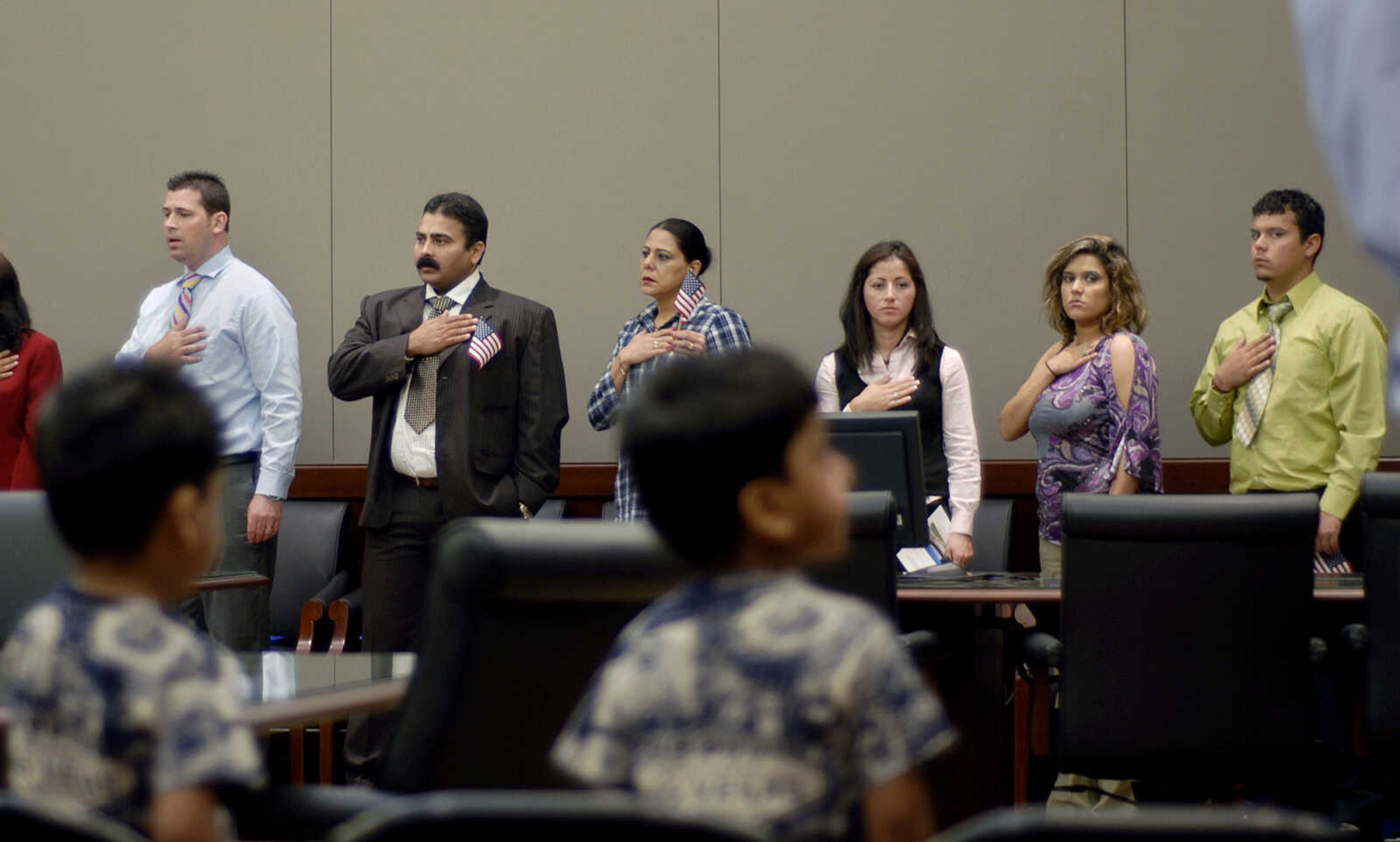 Bob Miller~bmiller@semissourian.com
Eighteen people become citizens of the United States of America Monday, April 25, 2011 during the Naturalization Ceremony at the Rush Hudson Limbaugh, Sr. United States Courthouse in Cape Girardeau.