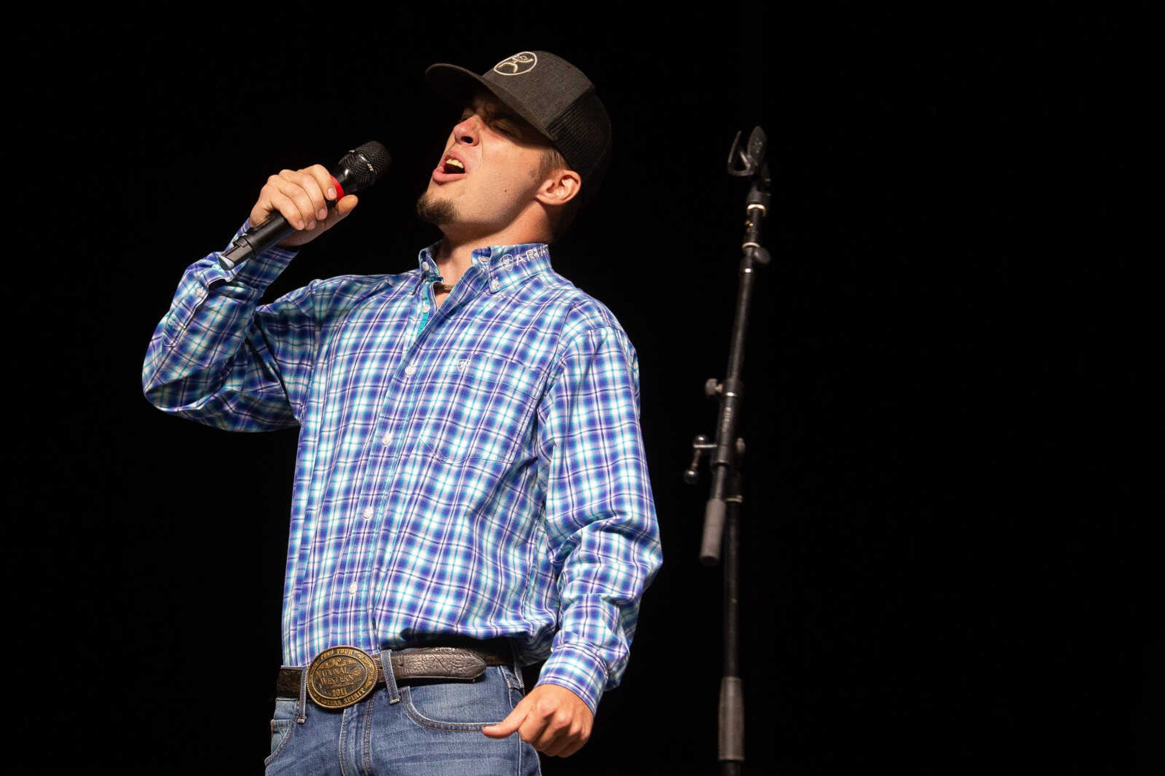 Joe Wilcox sings during the Heartland Idol Finals competition on Monday, Sept. 12 at the SEMO District Fair in Cape Girardeau.