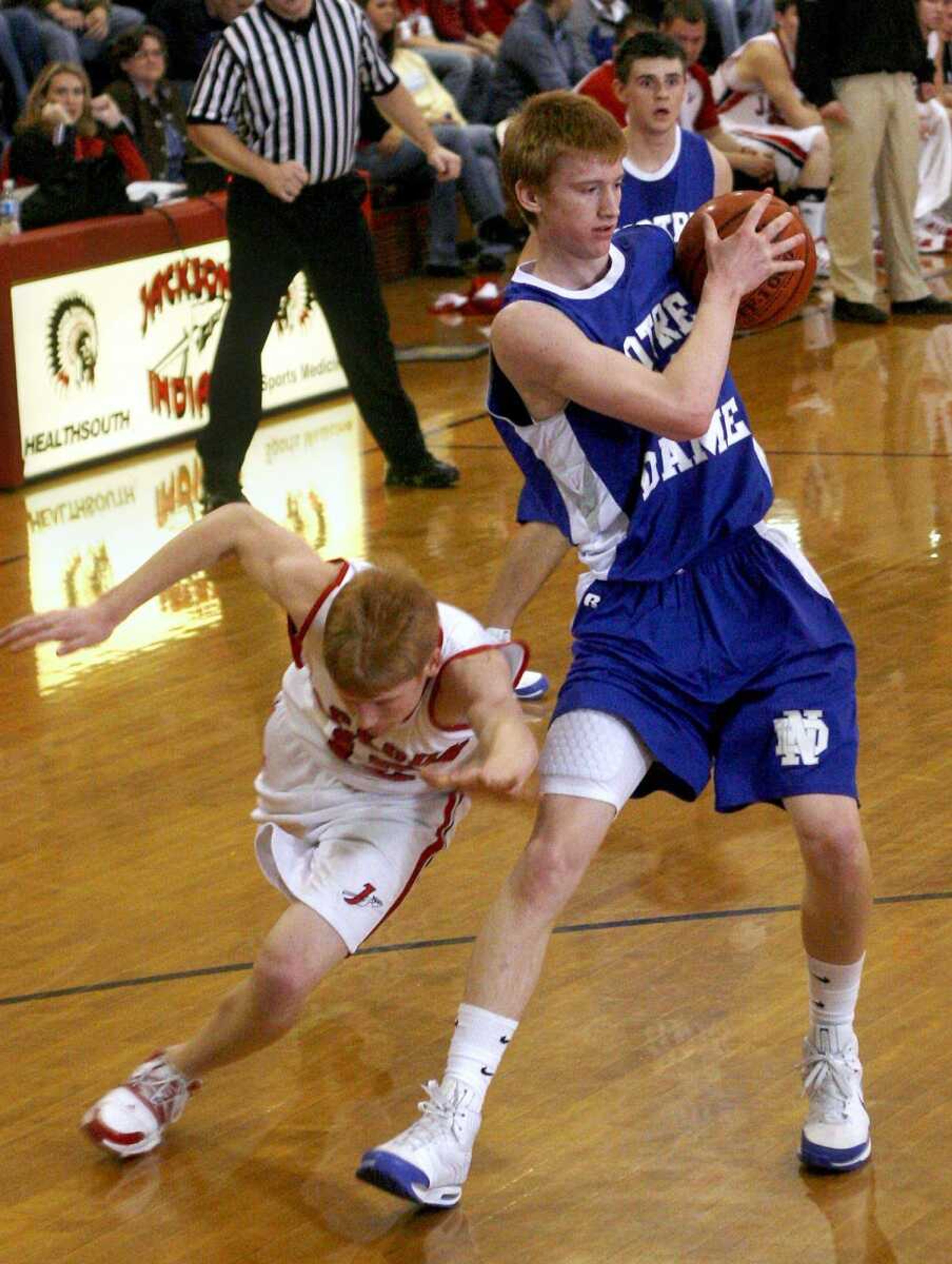 ELIZABETH DODD ~ edodd@semissourian.com
Notre Dame's Matt Helle, right, keeps the ball from being stolen from Jackson's Holt Walker during the second half.