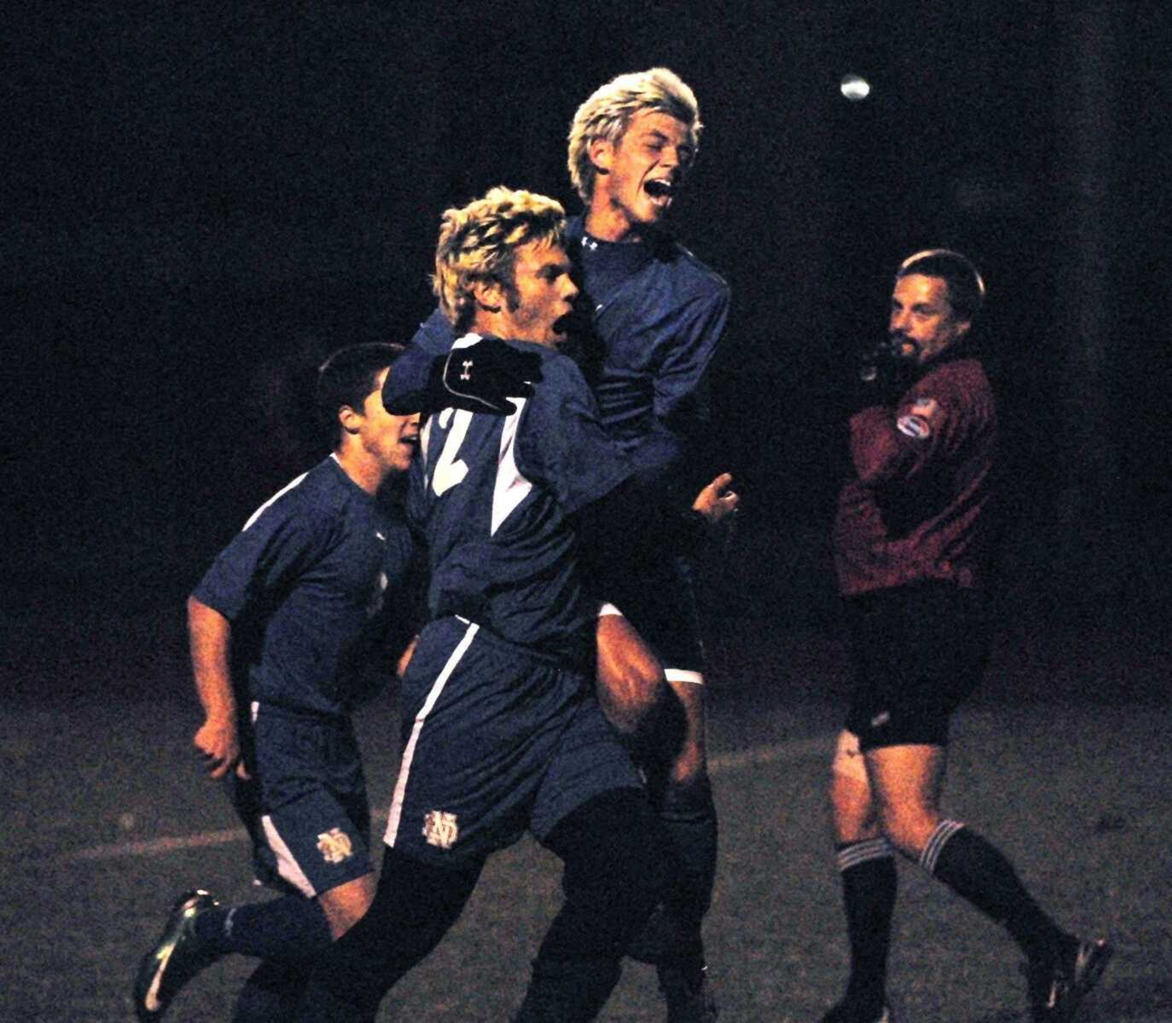 CHUCK WU ~ cwu@semissourian.comJohn Unterreiner of Notre Dame celebrets with teammate Joe Froemsdorf after he scores the first goal againist St. Mary.