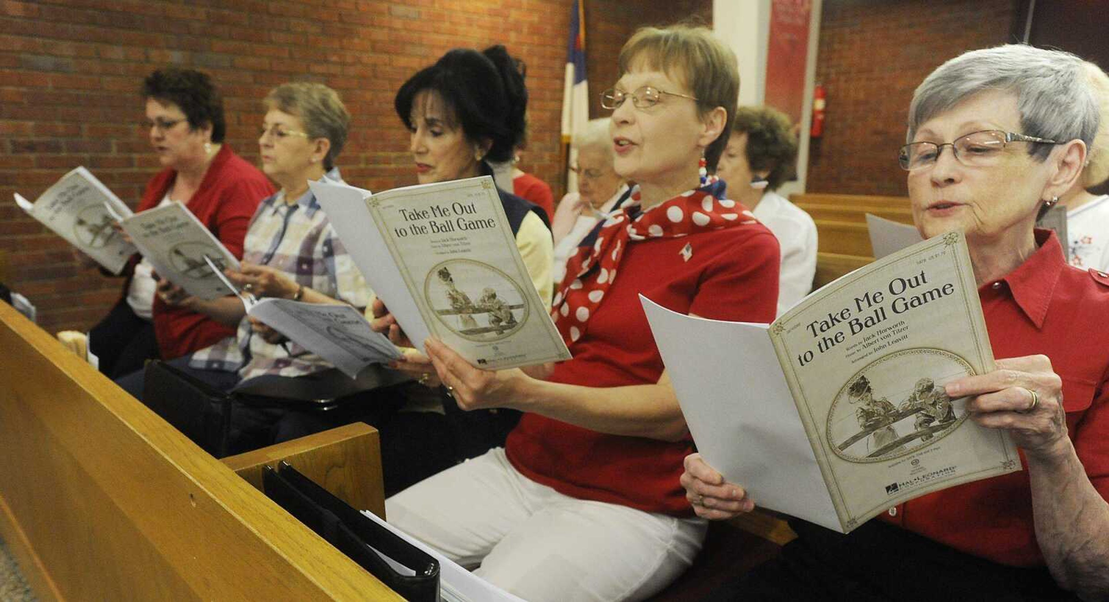 The St. Andrew Adult Choir performs &#8220;Take Me Out to the Ball Game,&#8221; during rehearsal Wednesday at St. Andrew Lutheran Church in Cape Girardeau. (Adam Vogler)