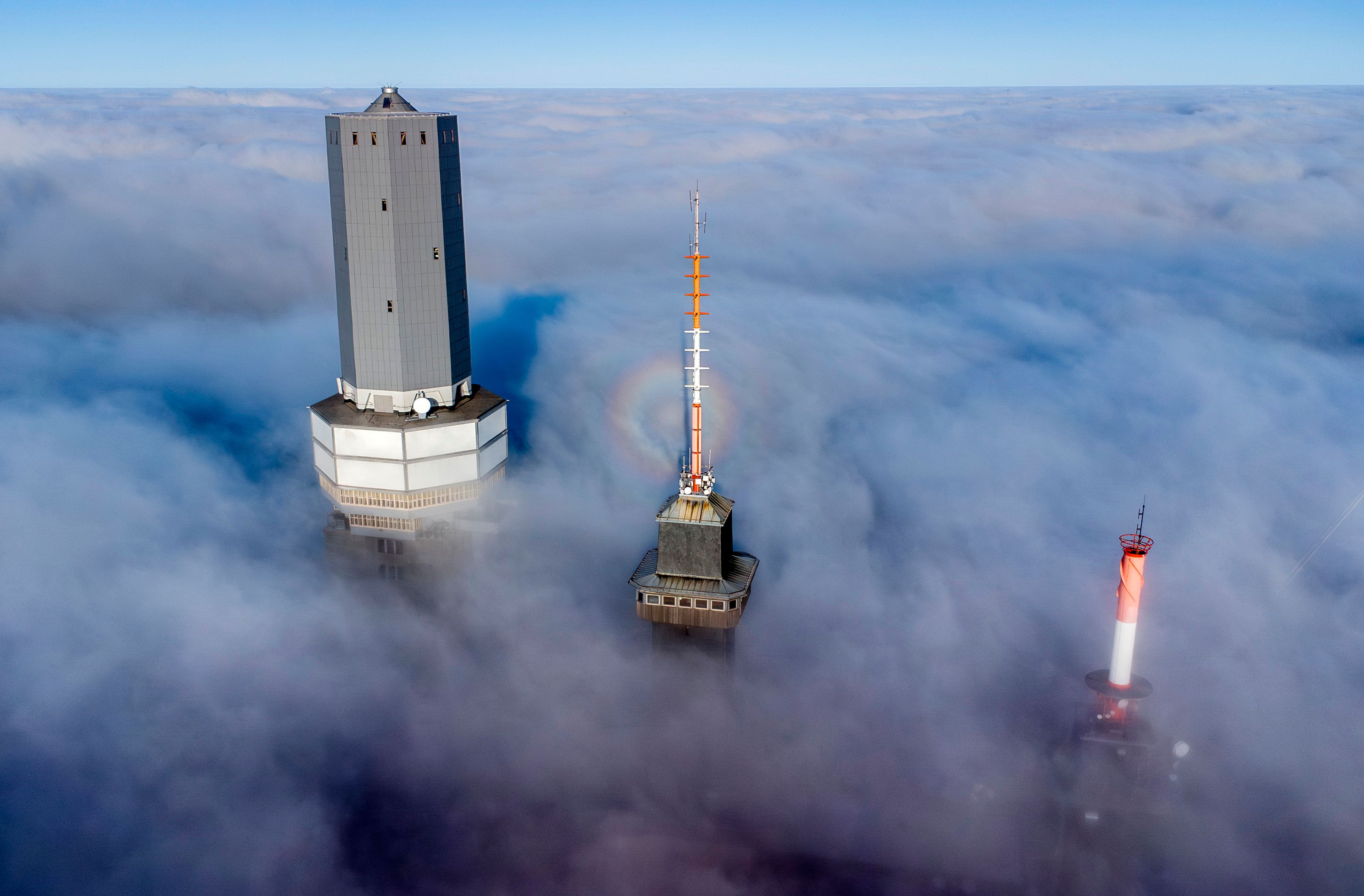 Telekom devices are surrounded by clouds on top of the Feldberg mountain near Frankfurt, Germany, Thursday, Nov. 7, 2024. (AP Photo/Michael Probst)