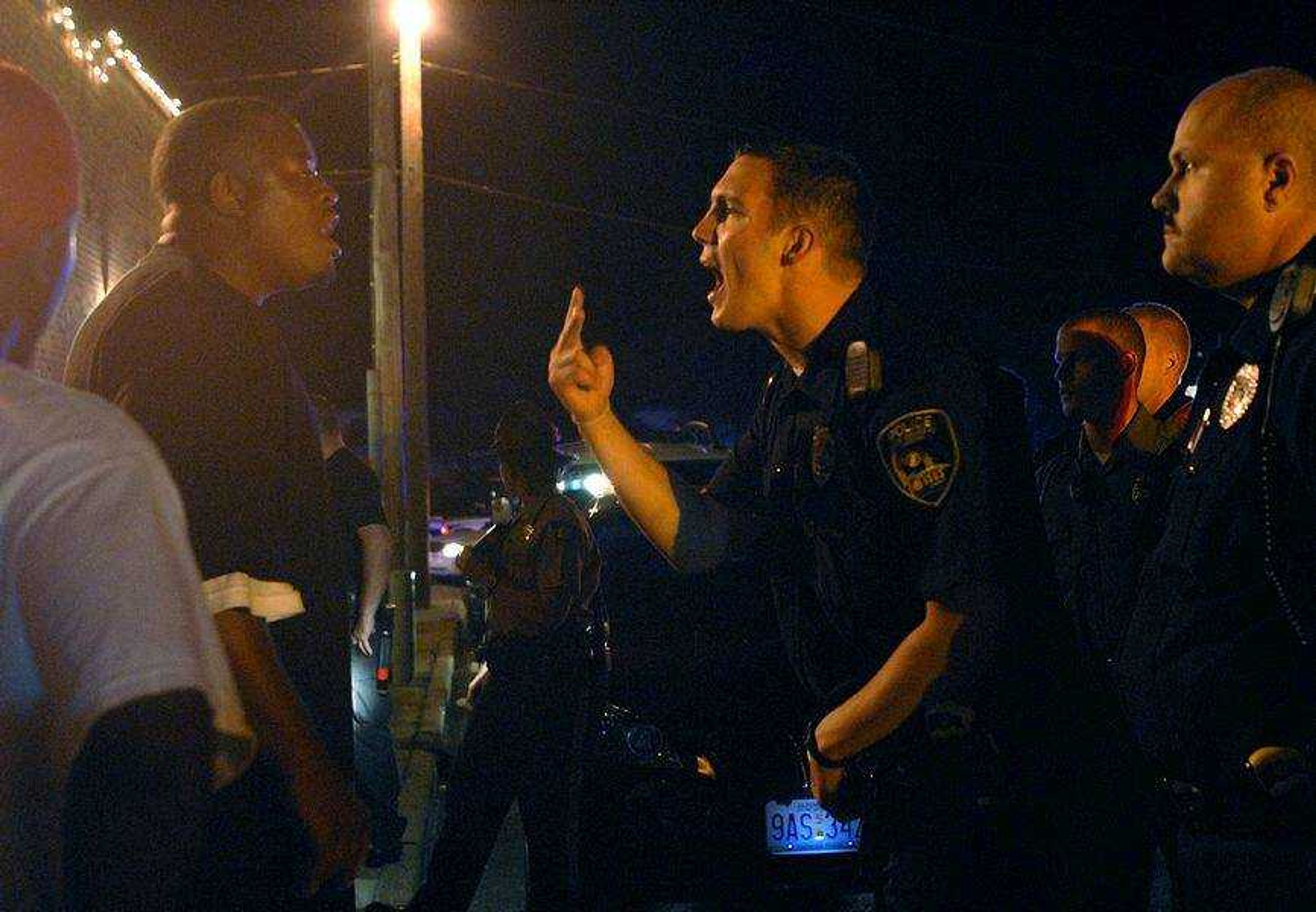 AARON EISENHAUER ~ aeisenhauer@semissourian.com
Police and witnesses argue following an incident outside the Copa on North Main Street in which police shot a suspect early Saturday morning, September 27, 2008.