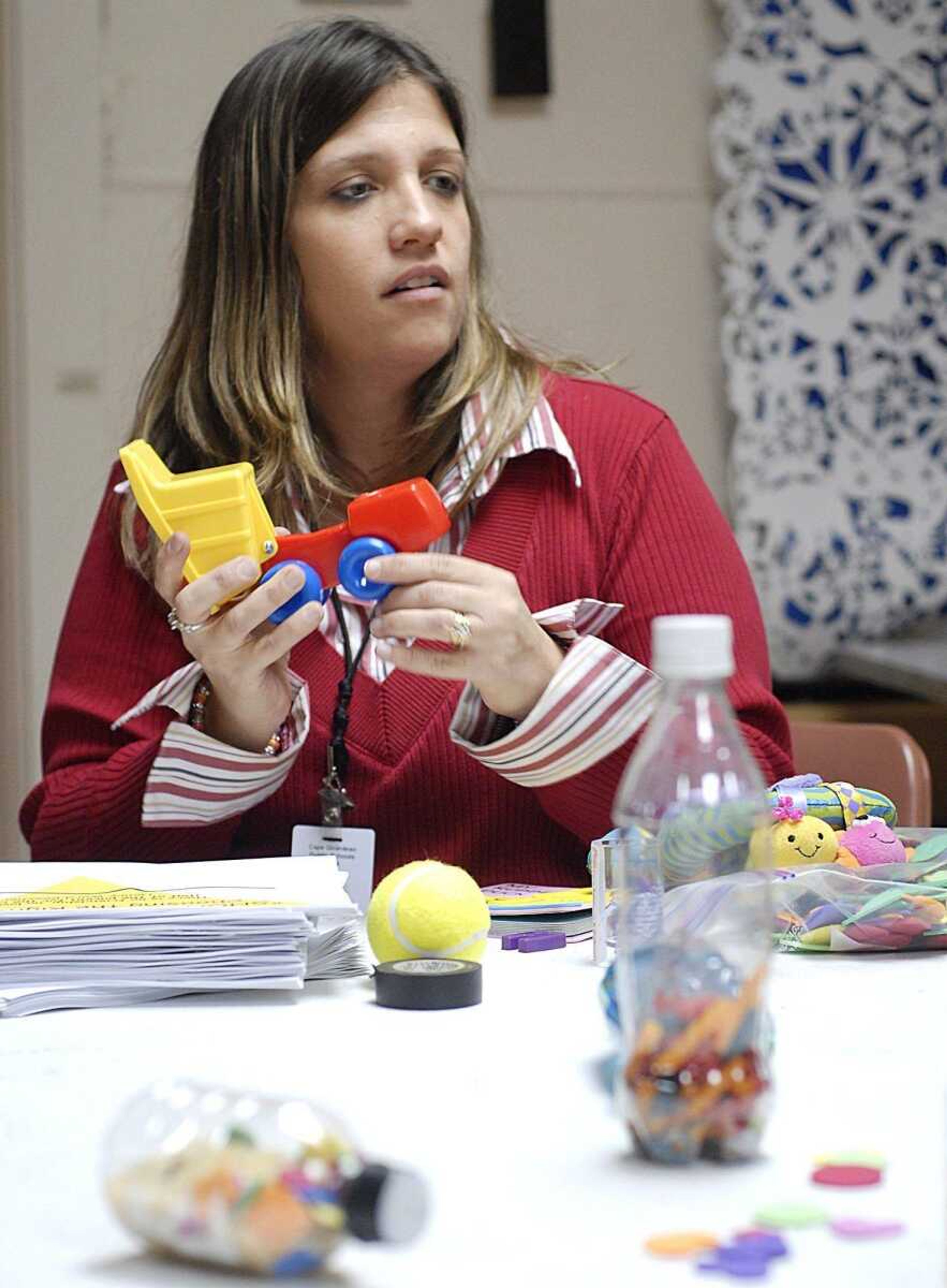 Stephanie Ellinger lead a session on toy safety Tuesday at the Family Resource Center. Participants learned to make safe toys and discussed possible hazards to watch out for. "With anything, just supervise and just be there," Ellinger advised. (Aaron Eisenhauer)