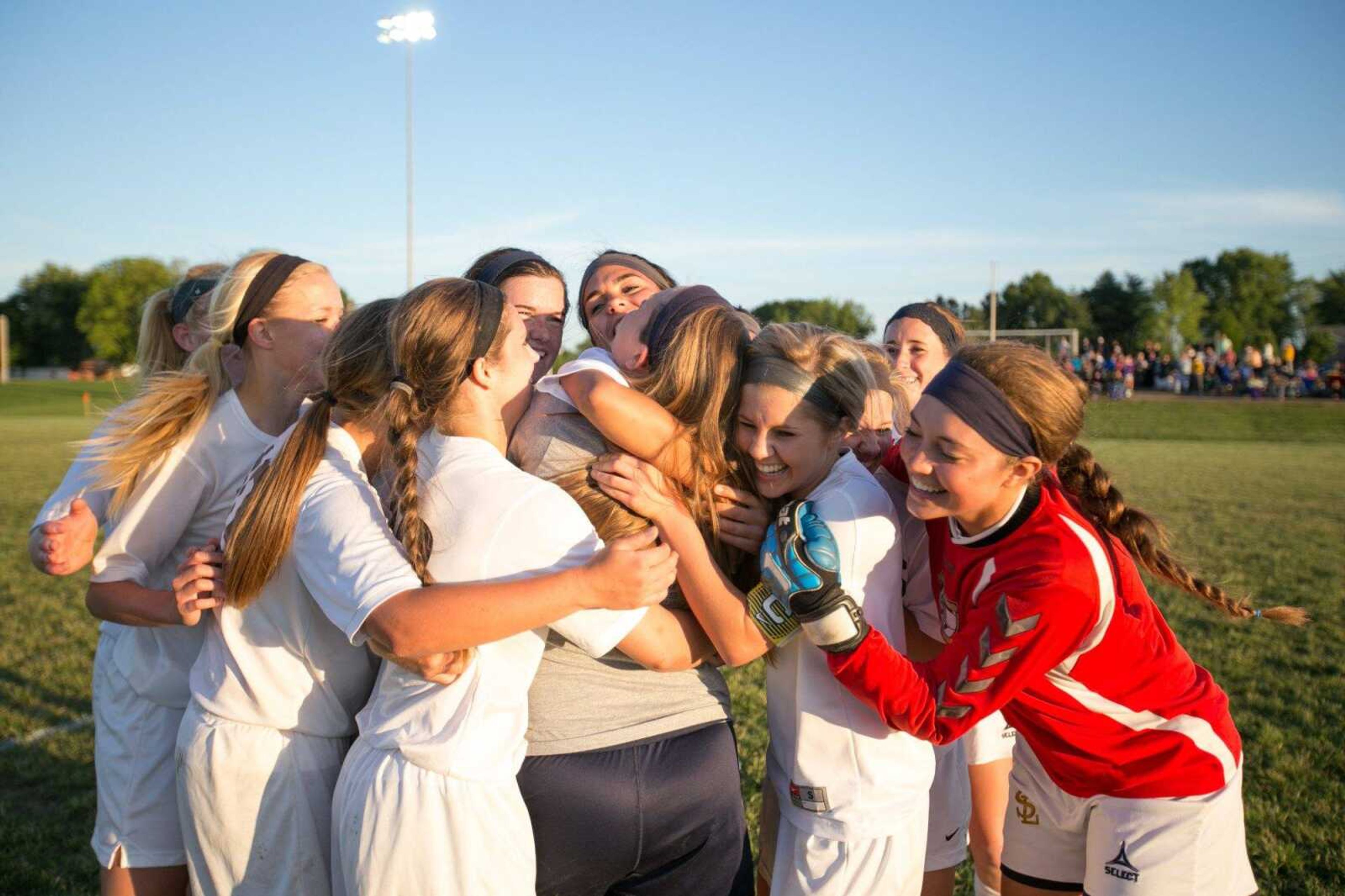 Saxony Lutheran players celebrate their win over St. Vincent in the Class 1 District 1 championship Thursday, May 21, 2015 in Perryville, Missouri. (Glenn Landberg)