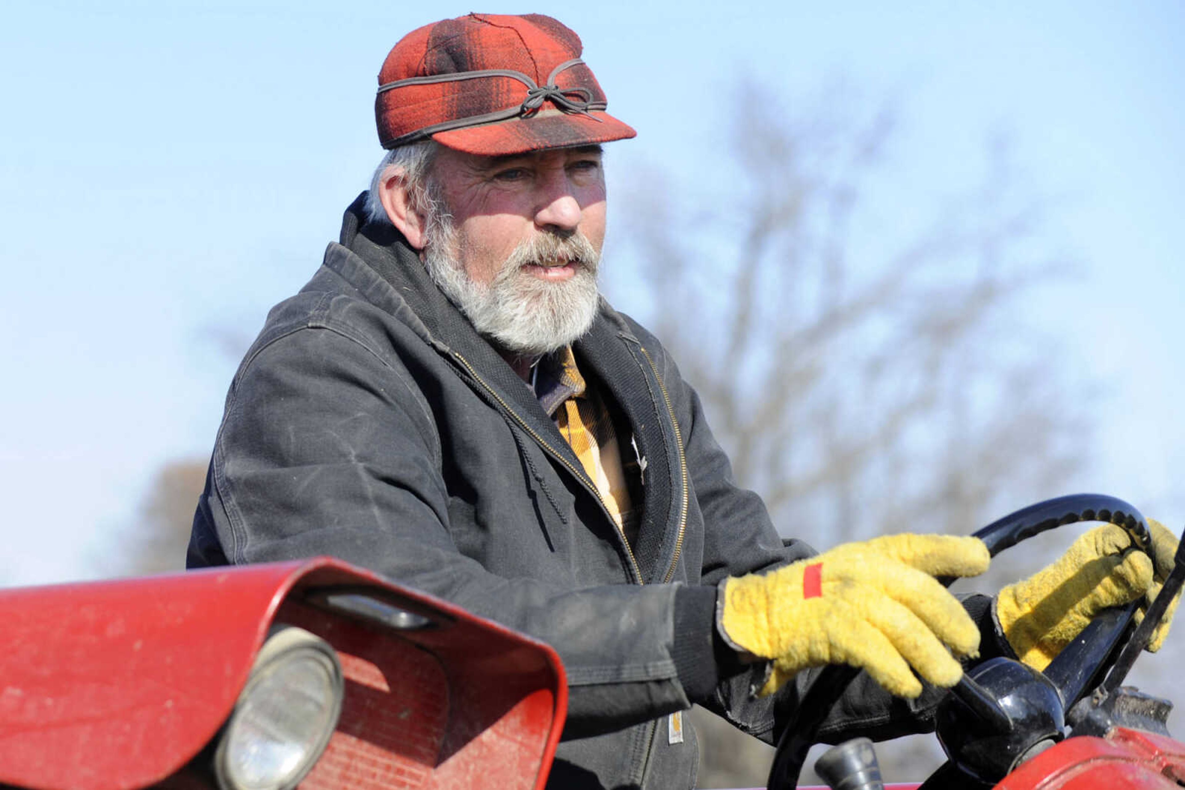 GLENN LANDBERG ~ glandberg@semissourian.com

Steve Meier drives a tractor pulling a wagon full of customers to a field of Christmas tree at Meier Horse Shoe Pines in Jackson Friday, Nov. 28, 2014.