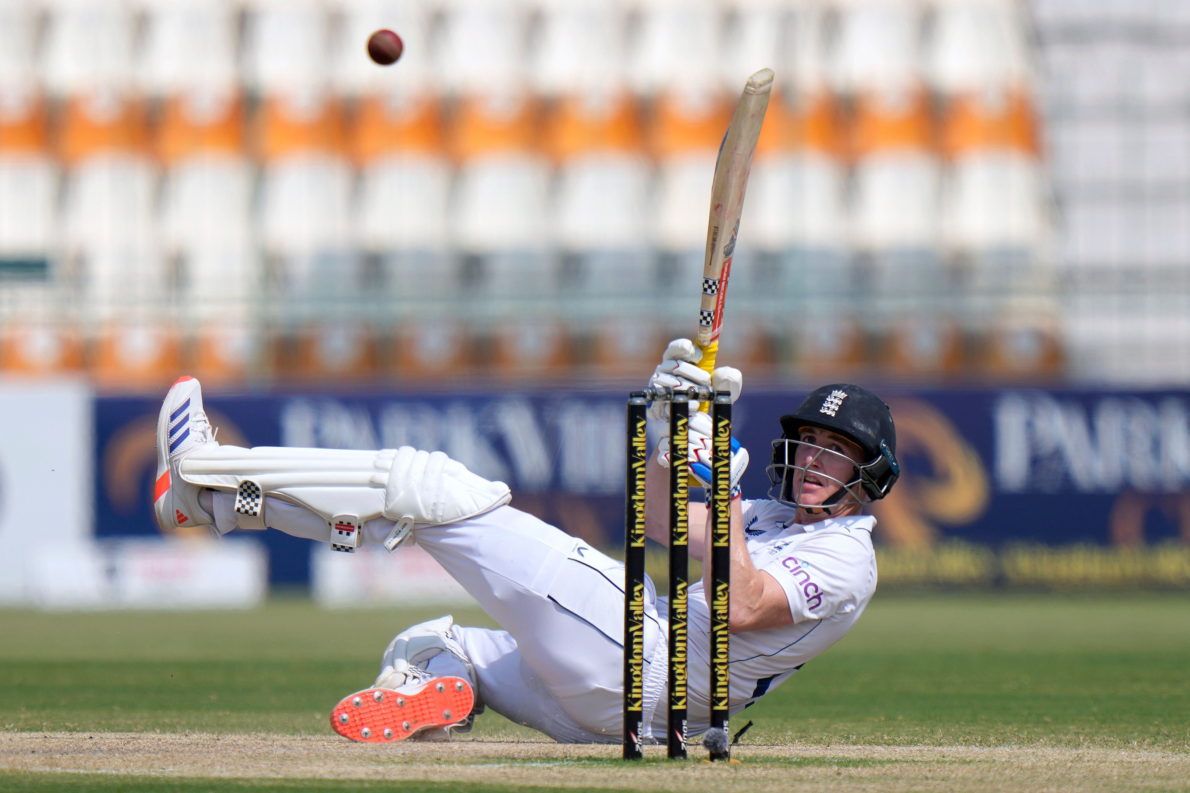 England's Harry Brook loses his balance while playing a shot during the fourth day of the first test cricket match between Pakistan and England, in Multan, Pakistan, Thursday, Oct. 10, 2024. (AP Photo/Anjum Naveed)