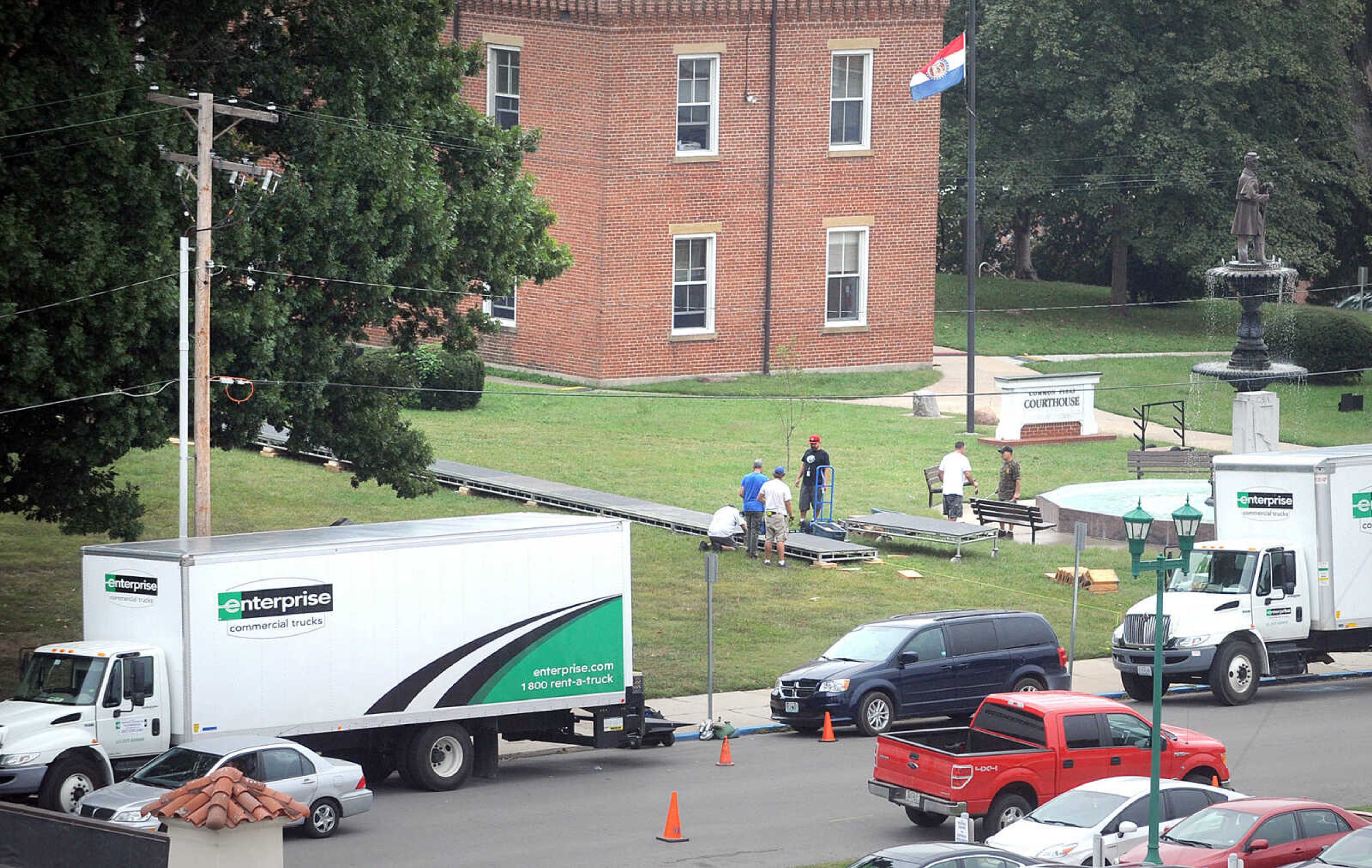 LAURA SIMON ~ lsimon@semissourian.com

Crew members prepare the lawn of the Common Pleas Courthouse for  filming a scene from 20th Century Fox's feature film "Gone Girl", Tuesday, Oct. 1, 2013, in Cape Girardeau.