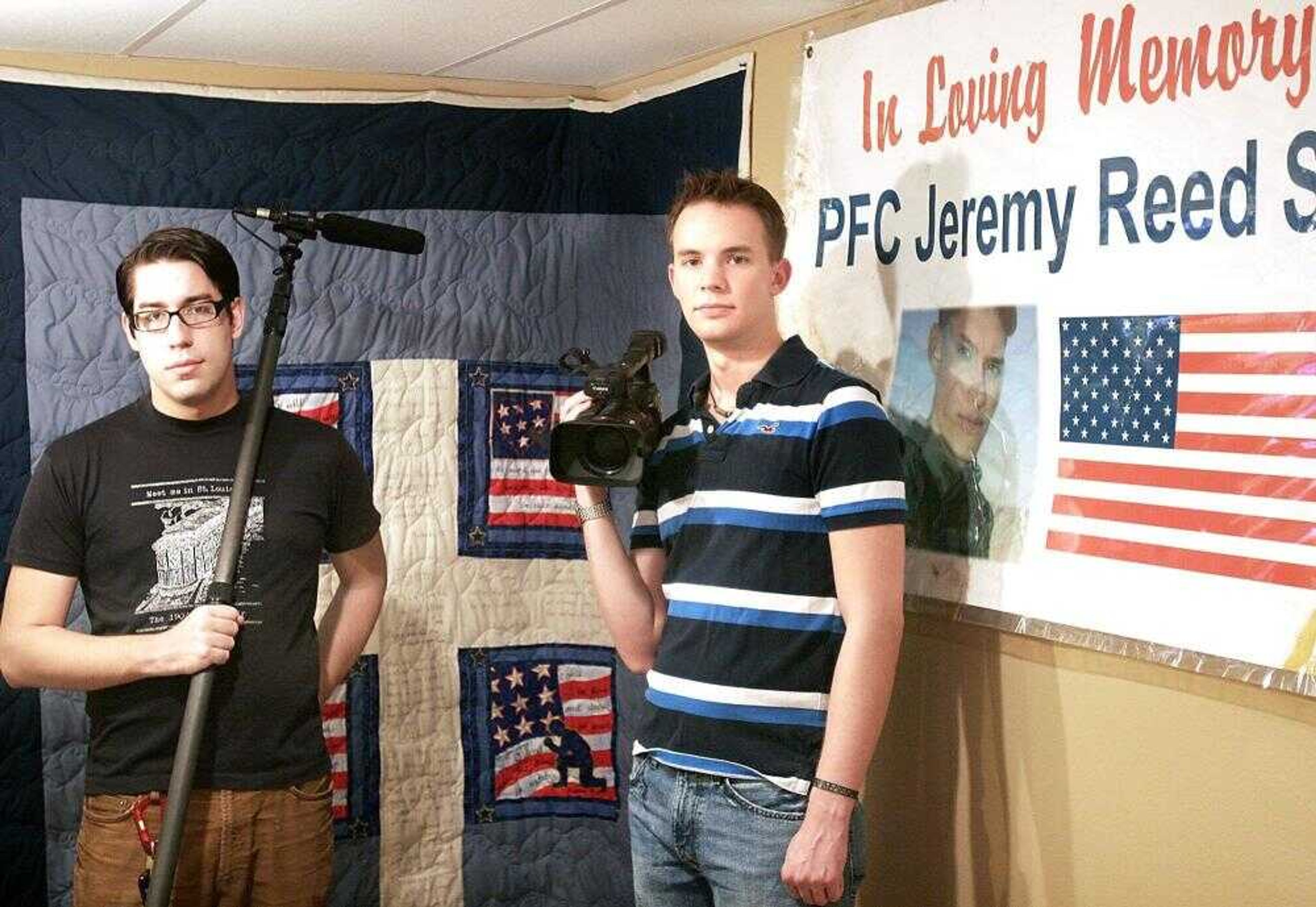 Filmmakers Blake Burress, left, and Chris Shank posed with mementos of Jeremy Shank, Chris' younger brother who died while serving in Iraq. The film is a tribute to both Jeremy and the city of Jackson for its support. (Kit Doyle)