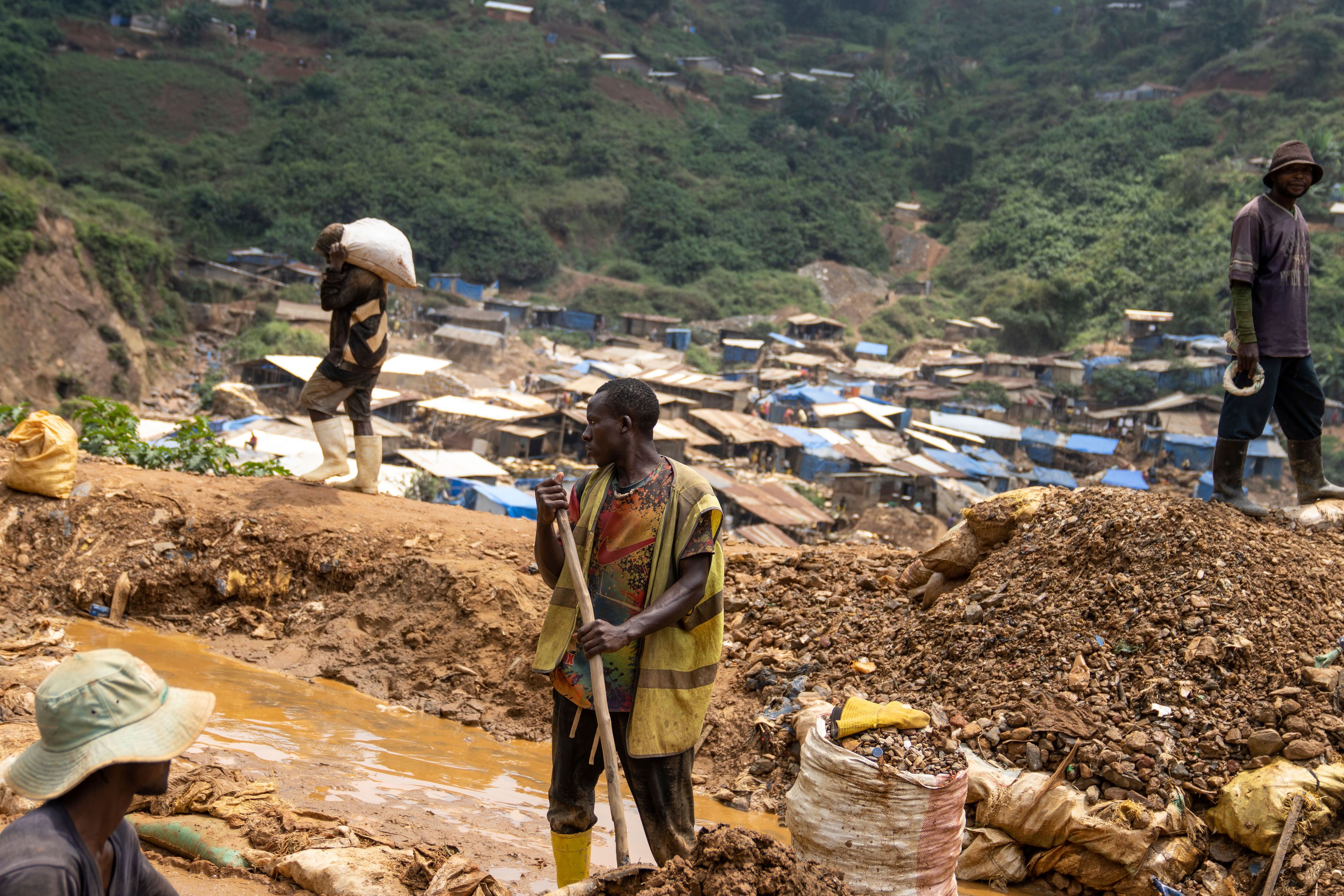 Gold miners at work in the town of Kamituga, in South Kivu province in eastern Congo, on Sept. 5, 2024. South Kivu is considered the epicenter of the world's latest outbreak of mpox. ( (AP Photo/Moses Sawasawa)