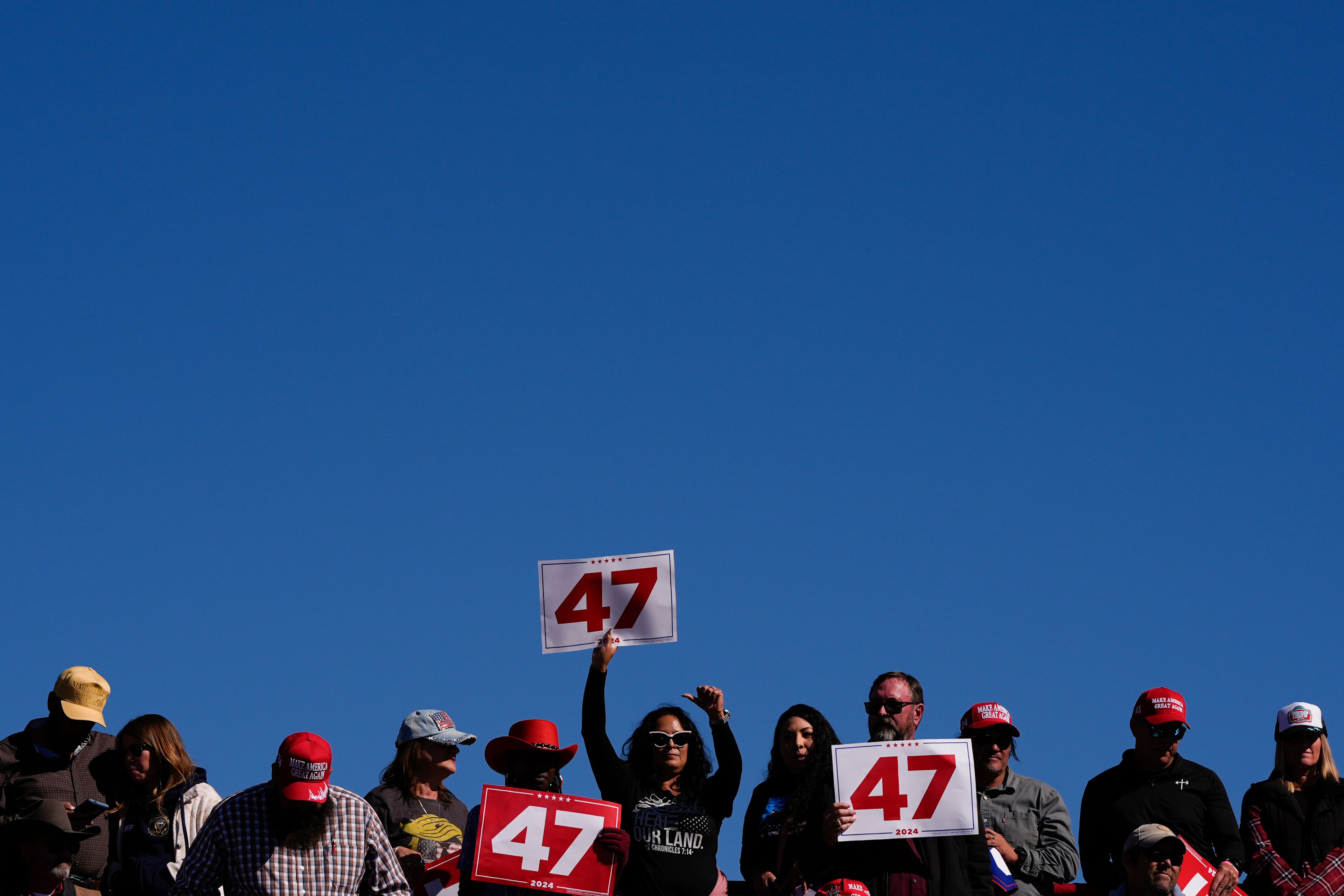 Supporters watch Republican presidential nominee former President Donald Trump speaks during a campaign rally at Albuquerque International Sunport, Thursday, Oct. 31, 2024, in Albuquerque, N.M. (AP Photo/Julia Demaree Nikhinson)