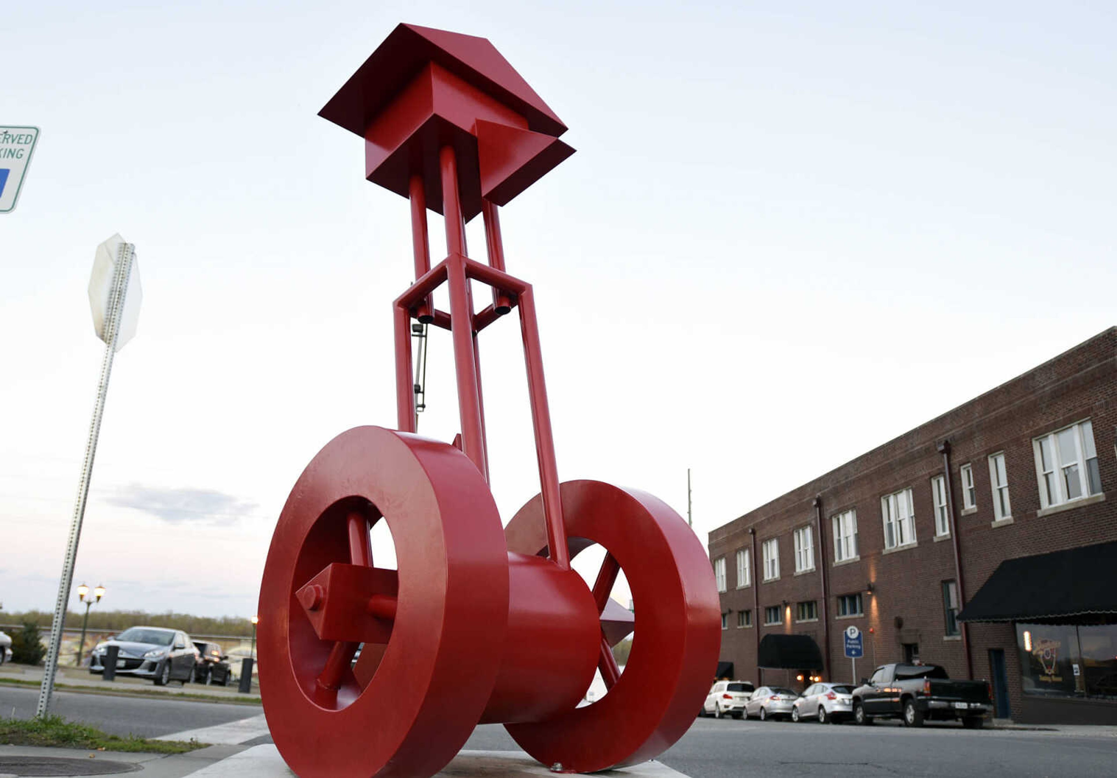 Andrew Arvanetes sculpture "Bird House" rests at the corner of Broadway and Main Street on Thursday evening, April 6, 2017, in Cape Girardeau.