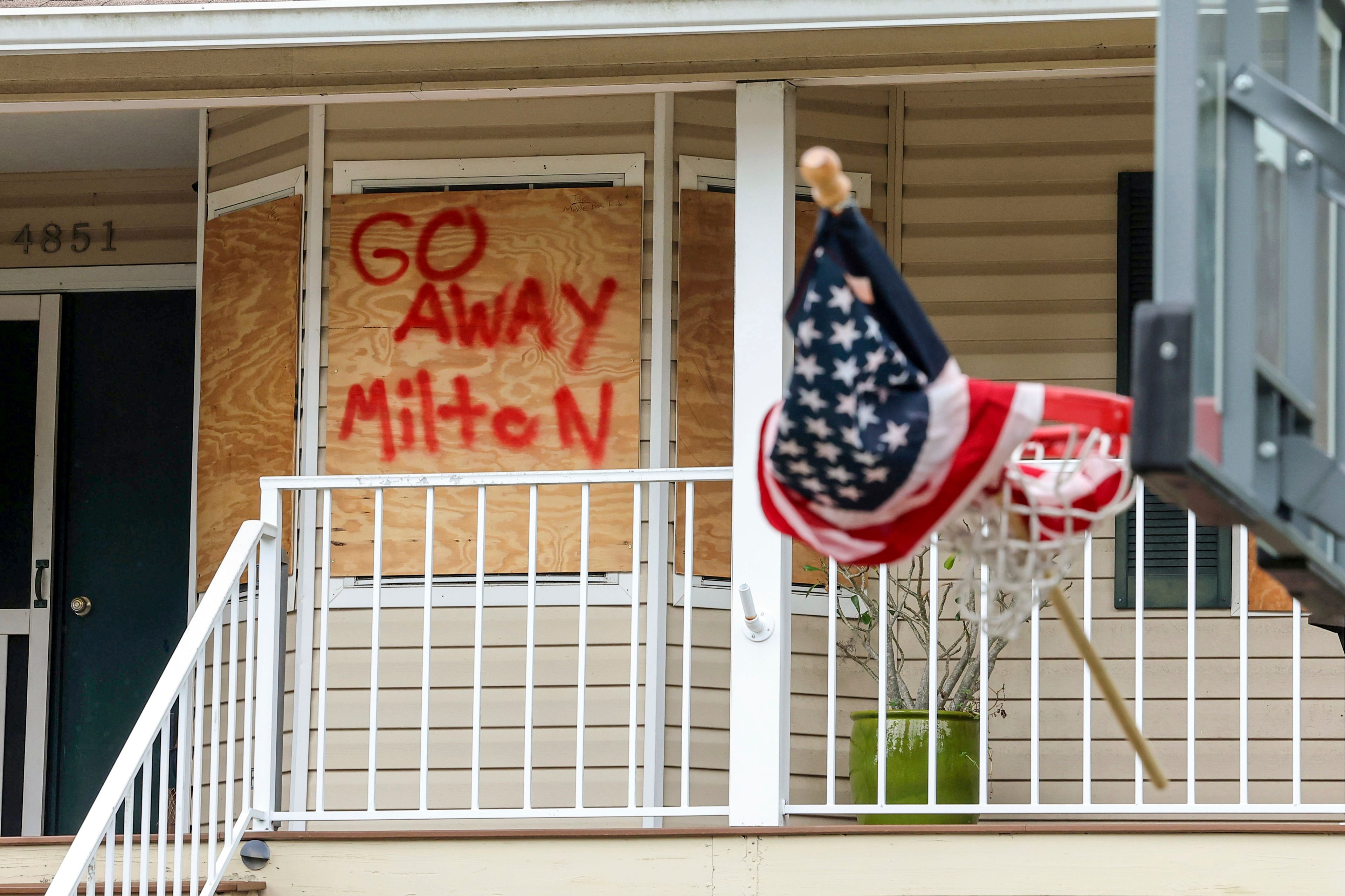 The home of the Weibel family is boarded up in preparation for Hurricane Milton on Monday, Oct. 7, 2024, in Port Richey, Fla. (AP Photo/Mike Carlson)