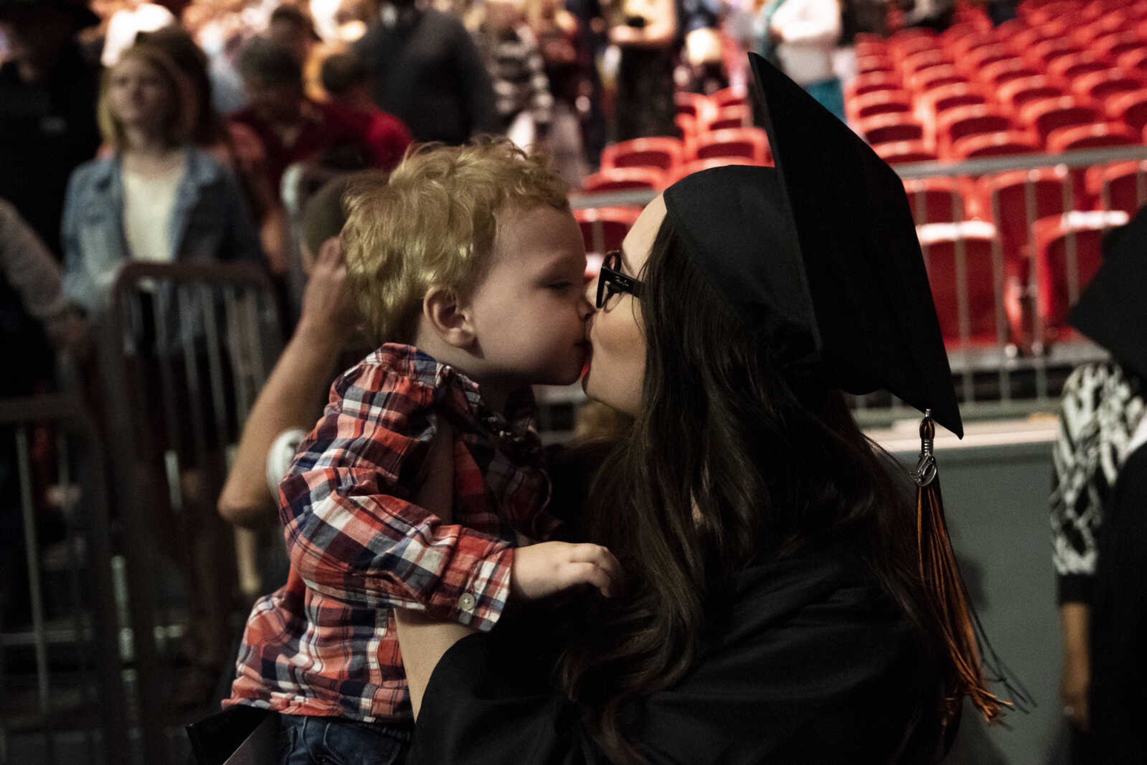 Emily Medlock receives a kiss from her son, Phoenix Young, 2, at the conclusion of the Cape Central High School Class of 2019 Commencement on Sunday, May 12, 2019, at the Show Me Center in Cape Girardeau.