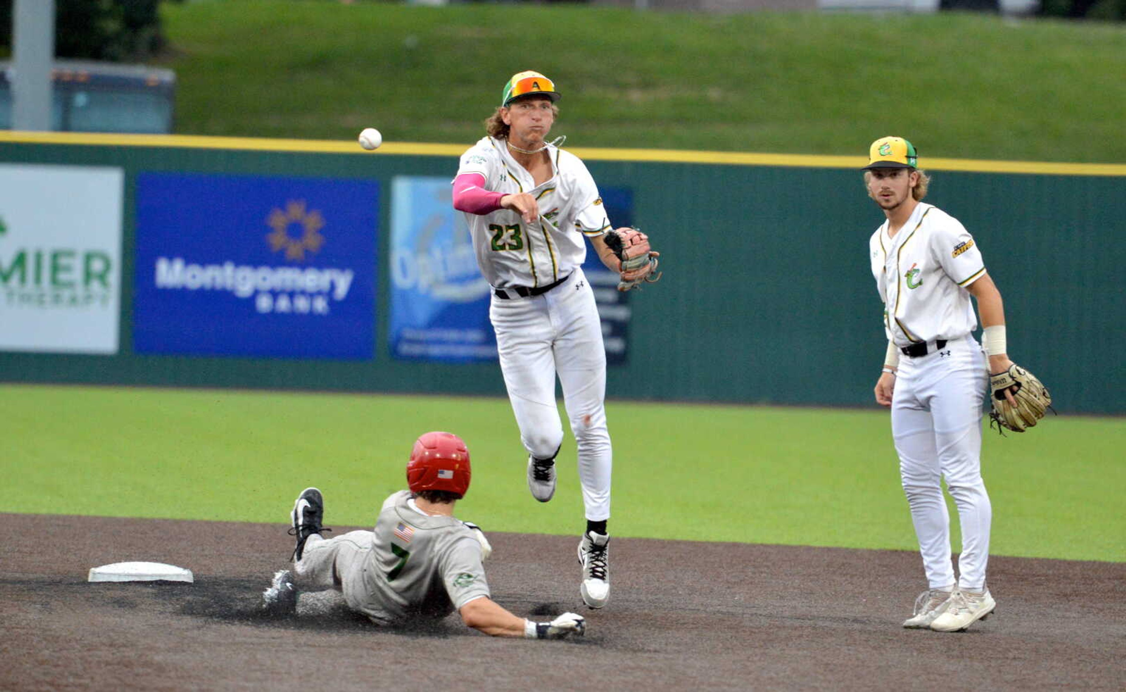 Cape's Lane Crowden makes a leaping throw to first during a Tuesday, June 18, 2024 game between the Cape Catfish and the Alton River Dragons at Capaha Field in Cape Girardeau, Mo. Cape defeated Alton, 8-6.