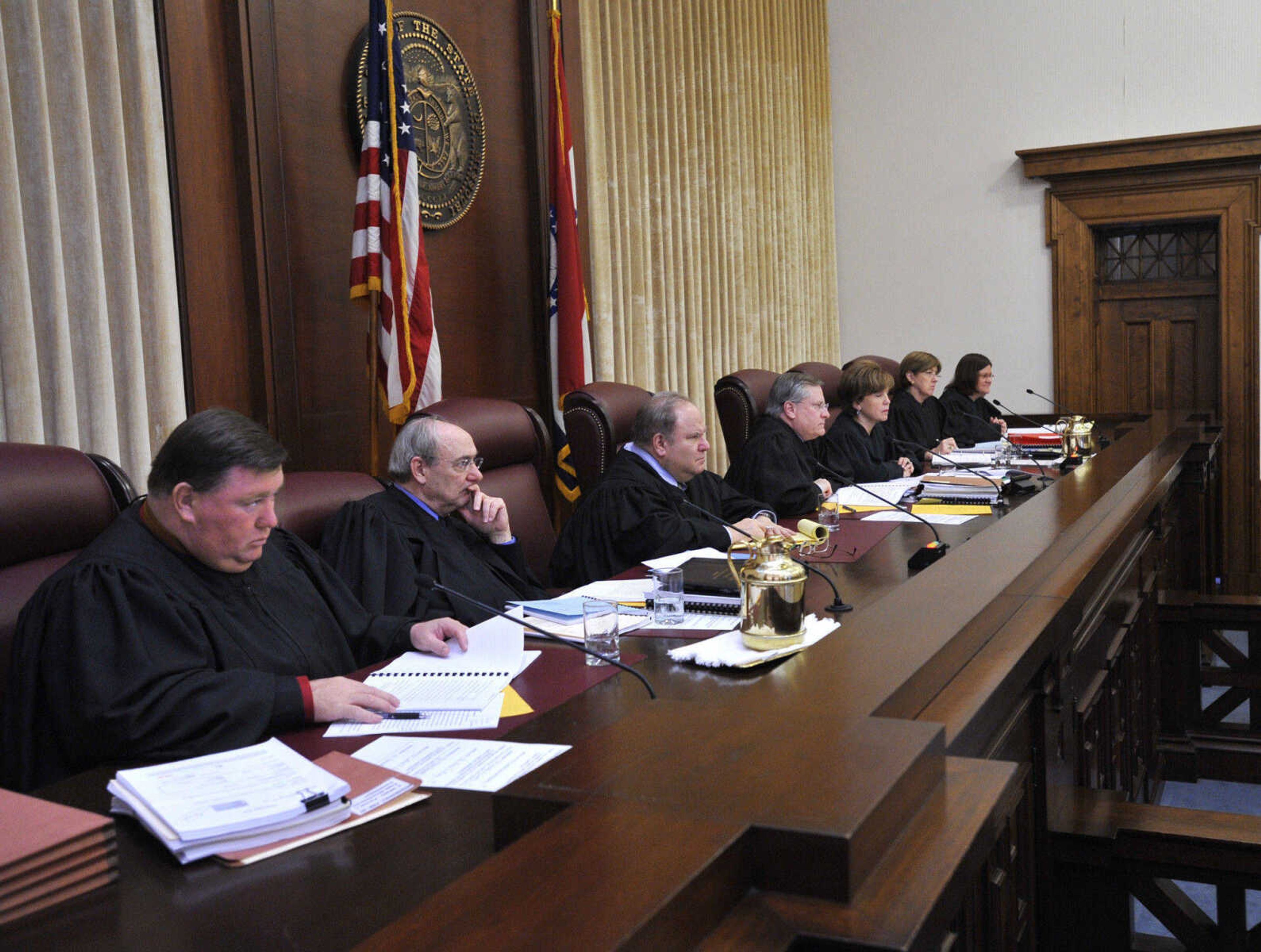 FRED LYNCH ~ flynch@semissourian.com
Members of the Missouri Supreme Court hear oral arguments in Purcell v. Cape Girardeau County Commission Wednesday in Jefferson City, Mo. Justices, from left, are Zel M. Fischer, Michael A. Wolff, Richard B. Teitelman, Chief Justice William Ray Price, Jr., Mary R. Russell, Patricia Breckenridge and Laura Denvir Stith.