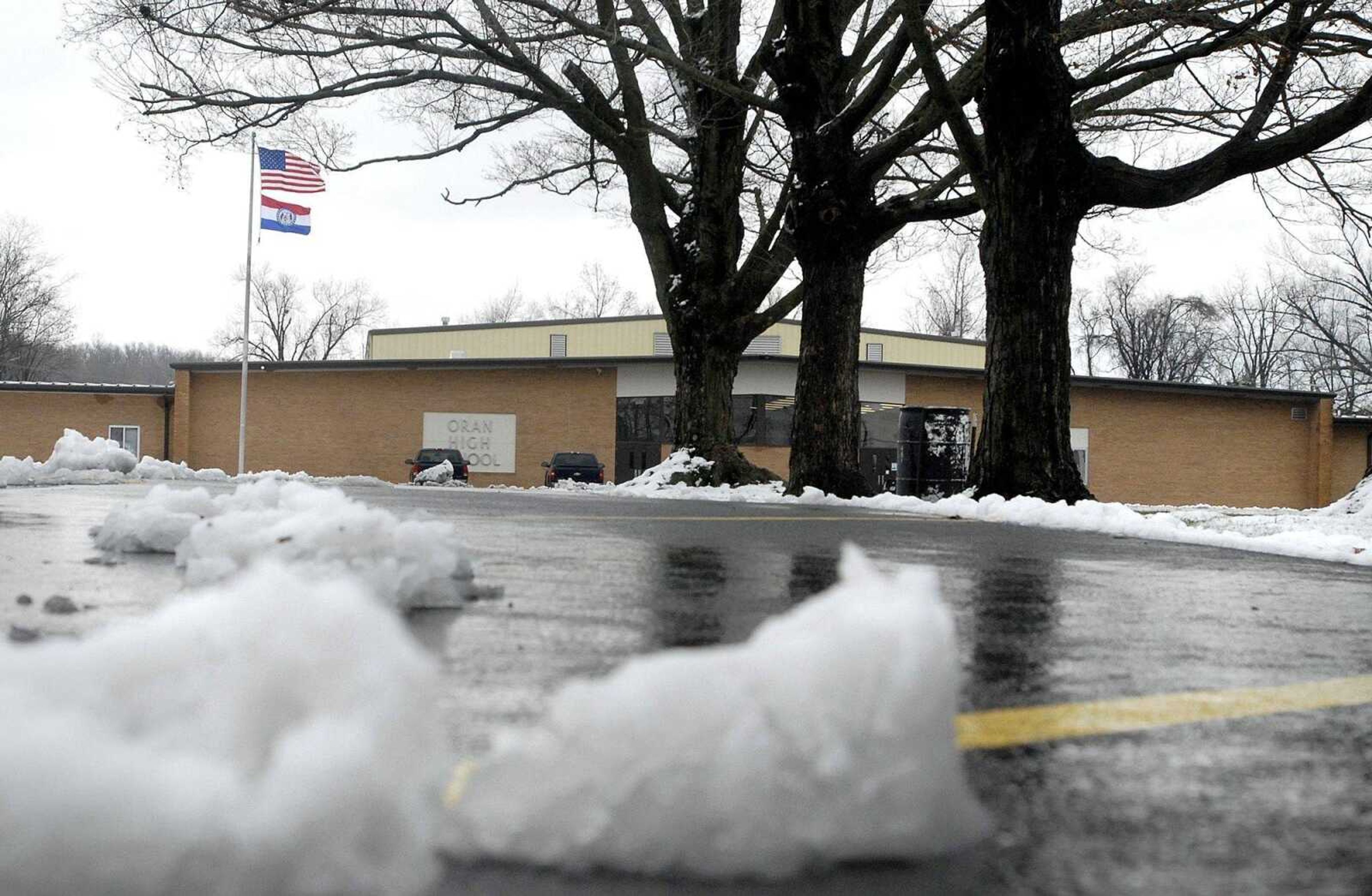 Chunks of snow litter the parking lot in front of Oran High School Tuesday, November 29, 2011 in Oran, Mo. (Laura Simon)