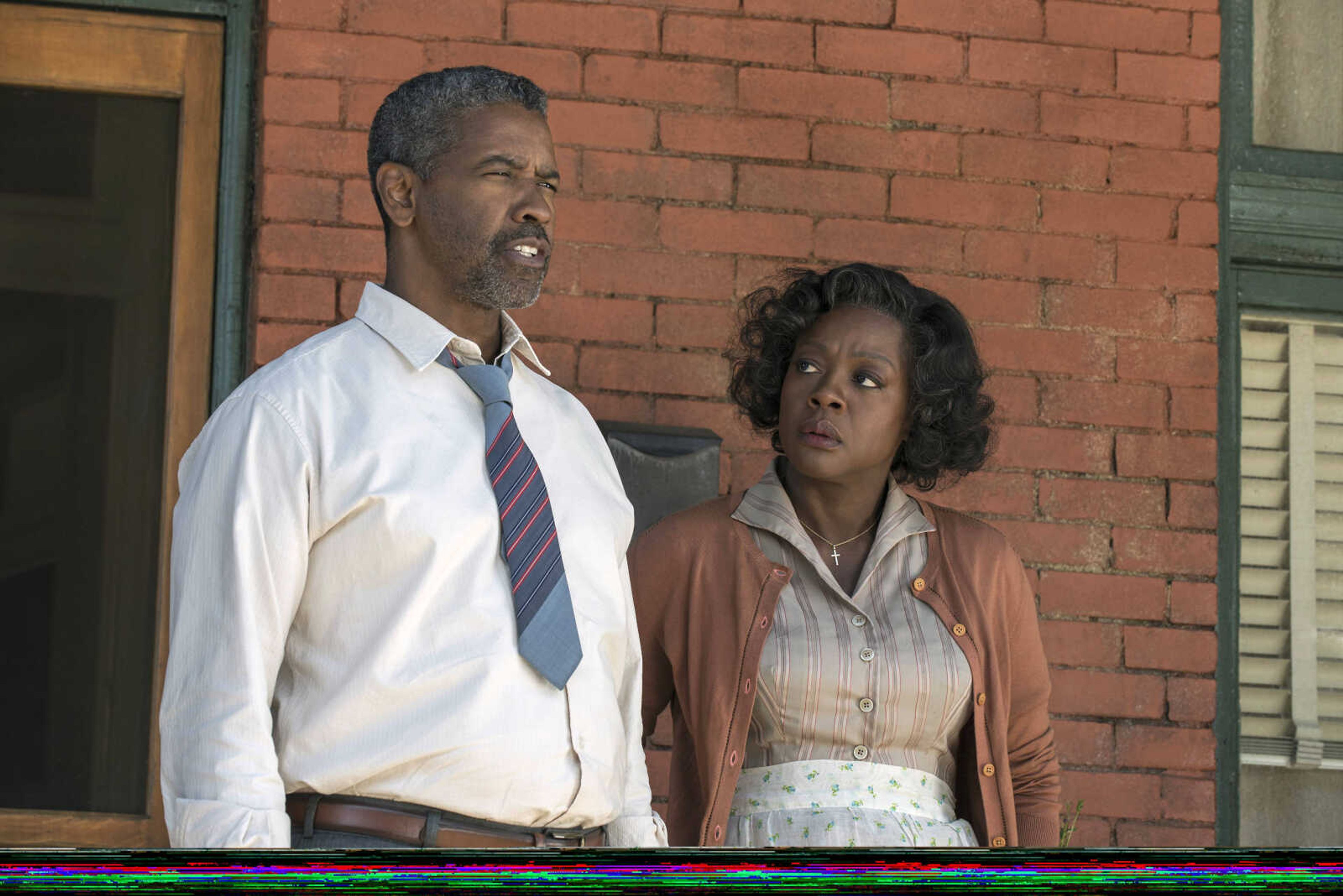 This image shows Denzel Washington, left, and Viola Davis in a scene from "Fences," directed by Washington.