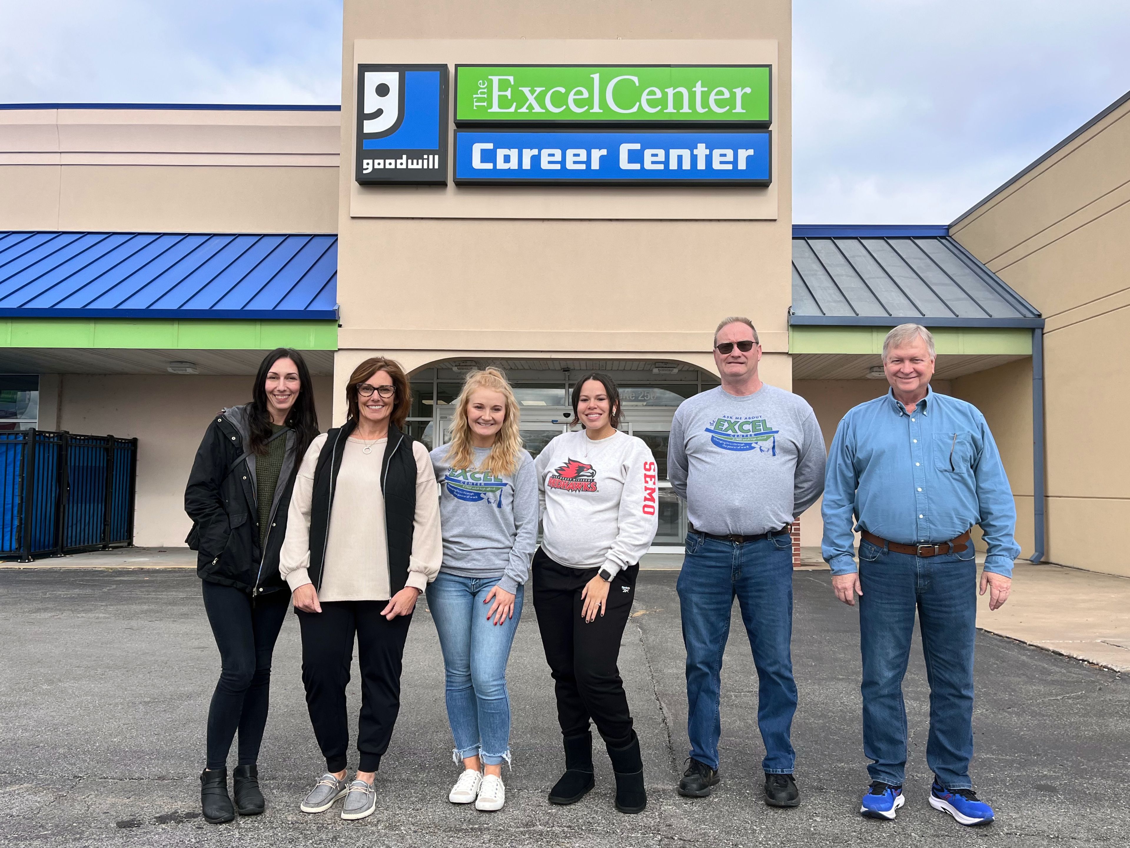 From left, student Courtney Cissell, Missouri Work Assistance and SkillUp director Robin Strop, life coaches Jessica Niedbalski and Alexia Robinson, teacher John Casebolt and director Blane Keel in front of the MERS/Goodwill Excel Center in Cape Girardeau.