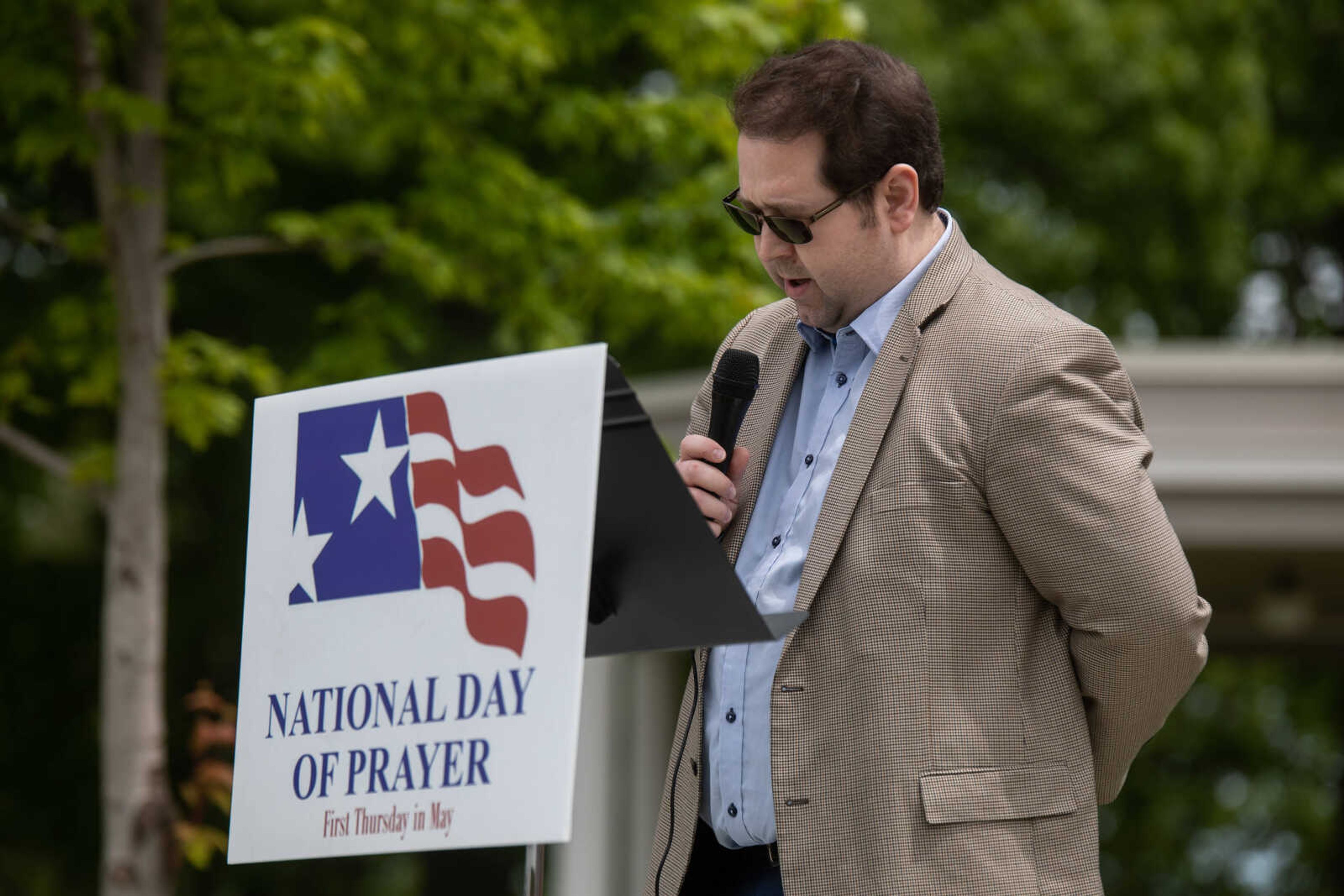 Lucas Presson, Assistant Publisher for the Southeast Missourian, leads a prayer for the media&nbsp;&nbsp;on Thursday, May 4 at Cape Girardeau City Hall.