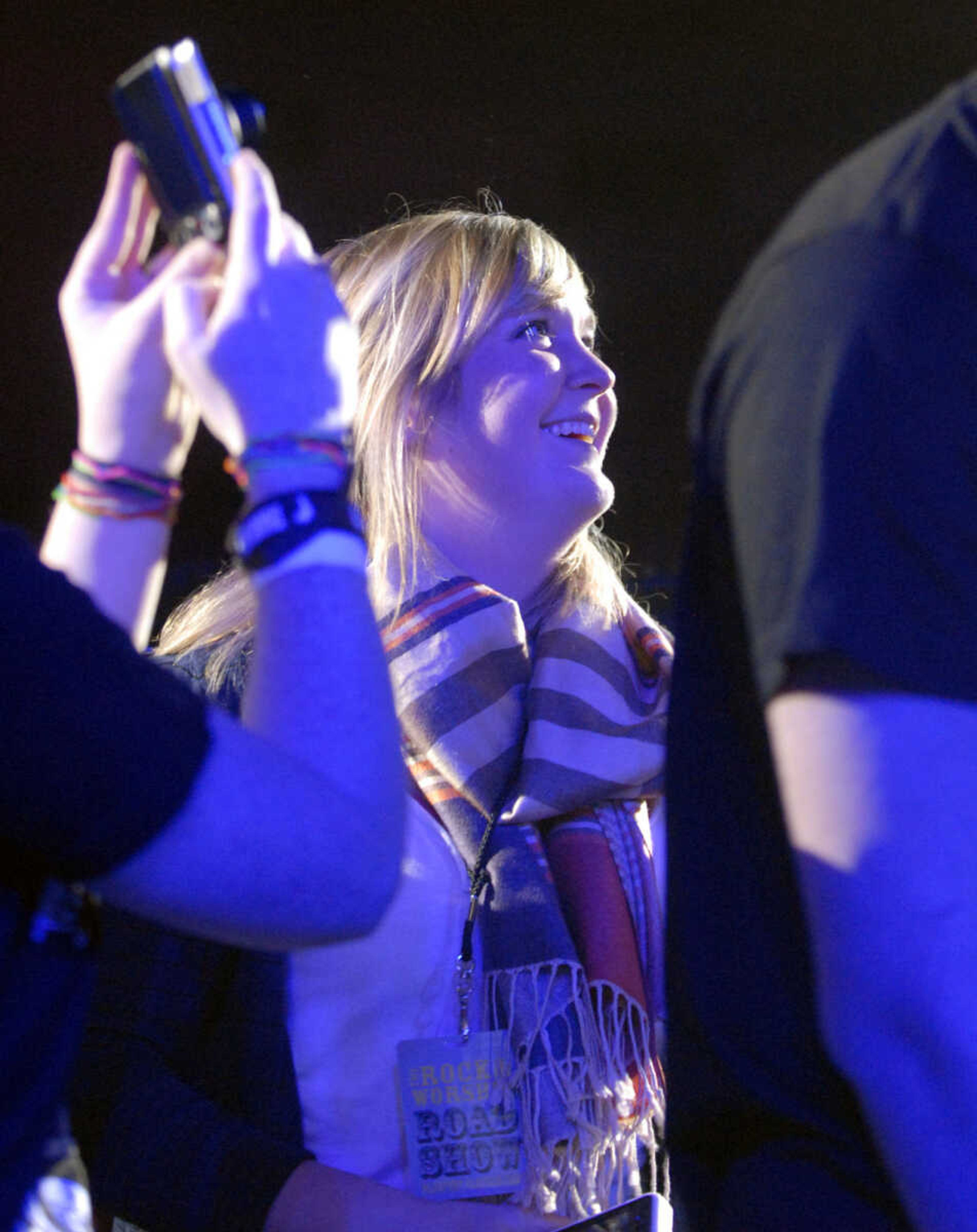 LAURA SIMON~lsimon@semissourian.com
A fan smiles after a high-five from the lead singer of The Afters Friday, January 28, 2011 during the Rock and Worship Roadshow 2011 tour at the Show Me Center in Cape Girardeau.