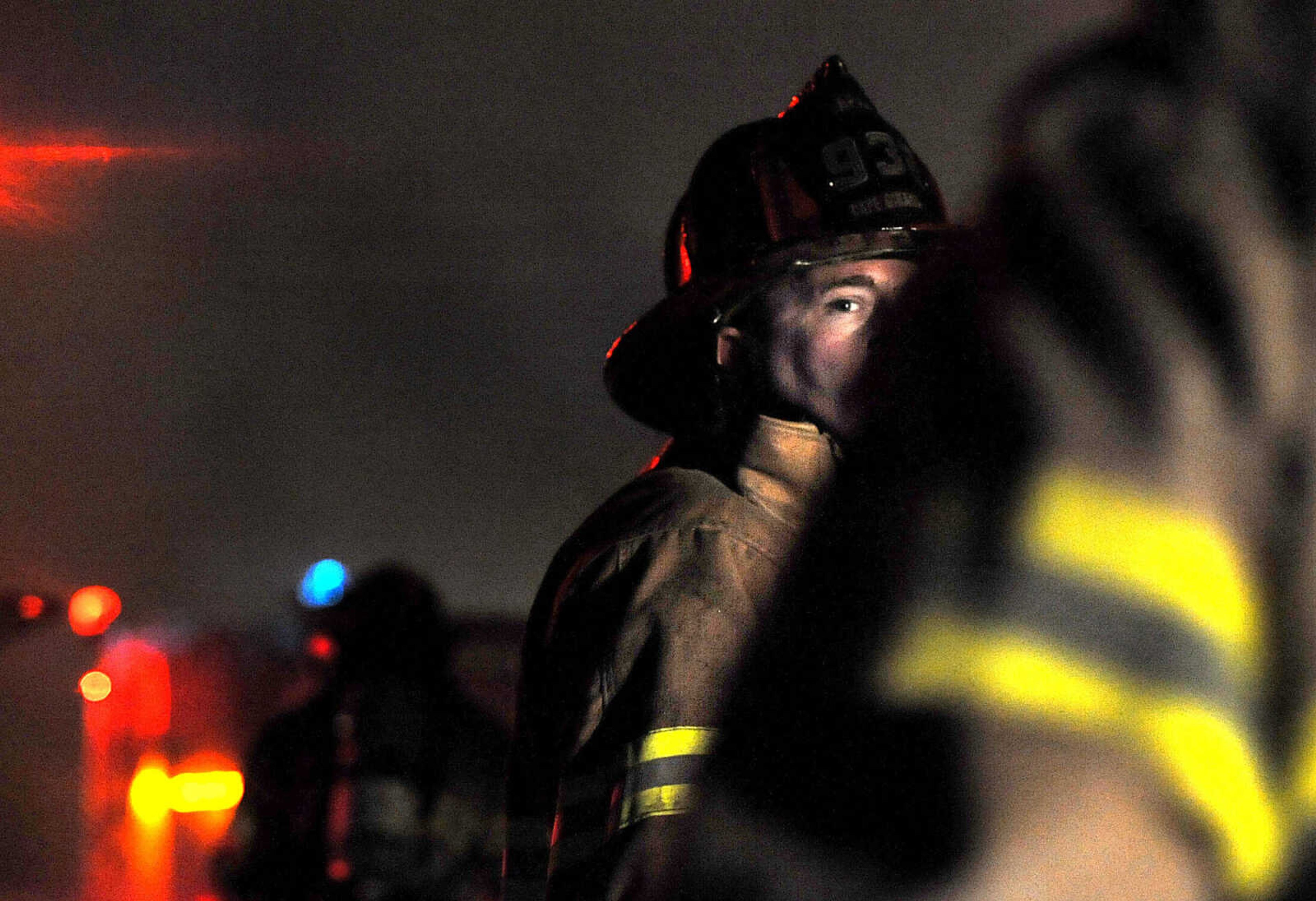 LAURA SIMON ~ lsimon@semissourian.com
Firefighters from Delta, Gordonville, Cape Girardeau, Millersville, Fruitland and East County Fire Departments battle a structure fire Wednesday night, January 9, 2012 on Onyx Lane in Cape Girardeau.