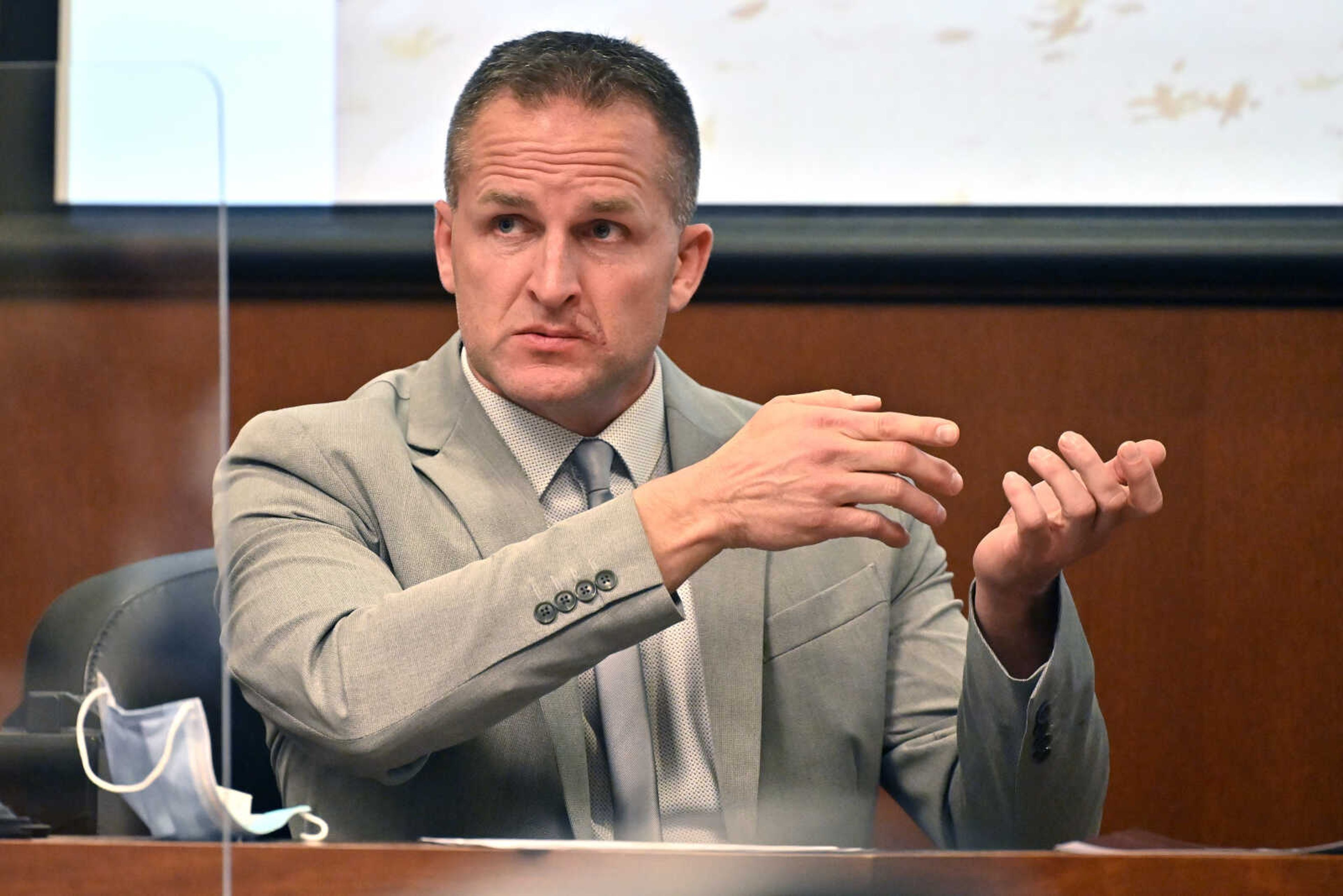 Former Louisville police officer Brett Hankison talks about seeing a subject in a firing stance in the apartment as he is cross-examined March 2, 2022, in Louisville, Kentucky.