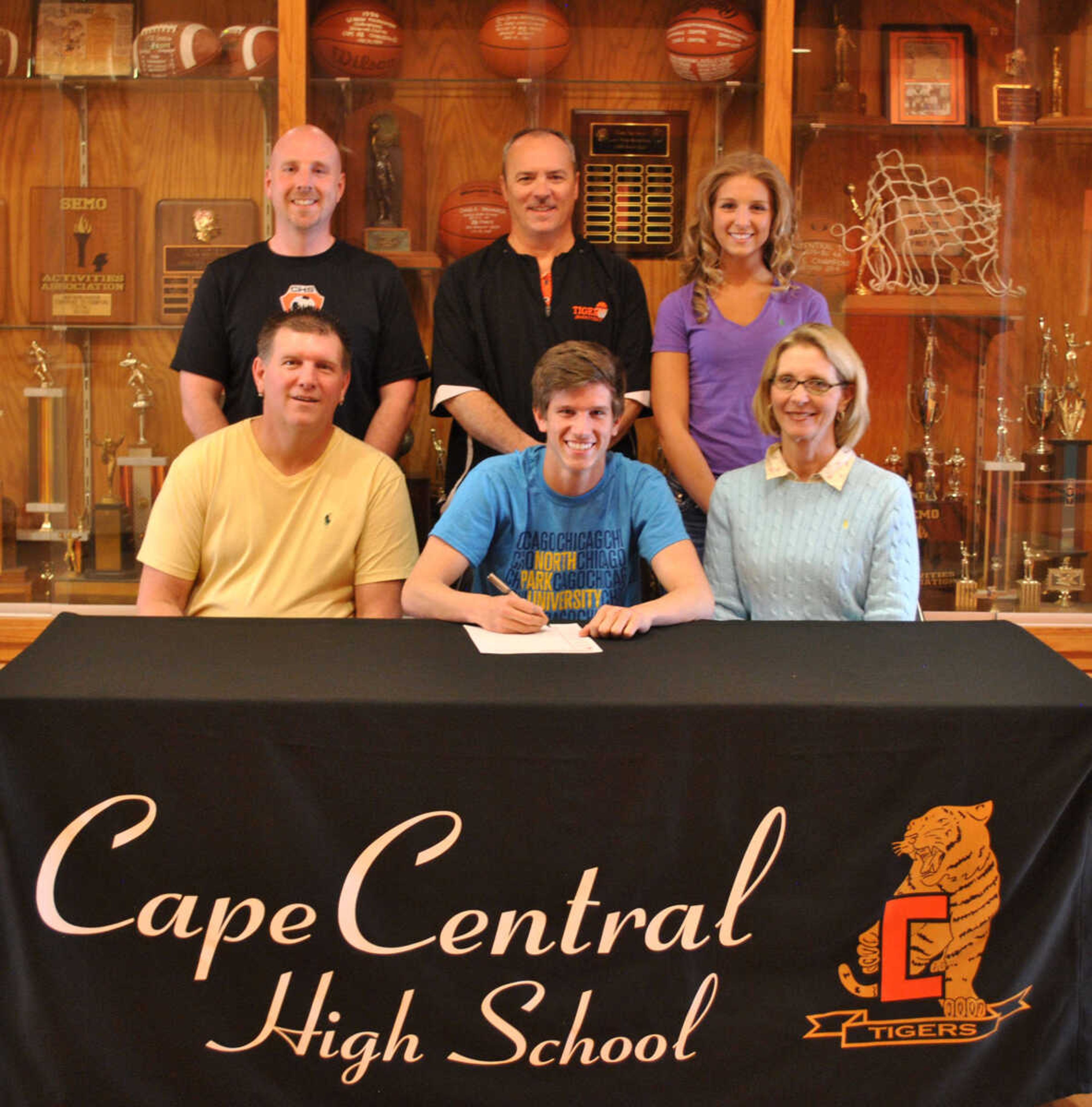 Pictured sitting with Duncan are his parents, Robin and Mark McKinley.  Standing, left to right, are CHS Head Coach Dan Martin, CHS Athletic Director Lance Tollison and sister, Ashlyn McKinley.