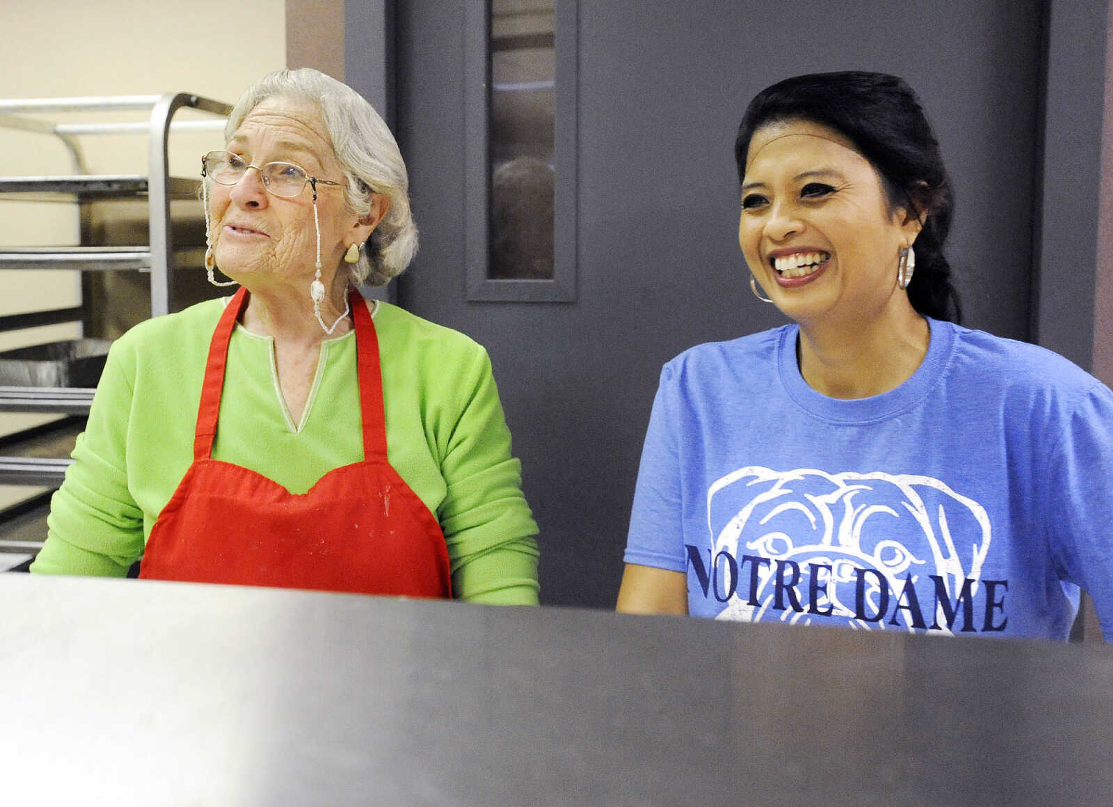 LAURA SIMON ~ lsimon@semissourian.com

Elaine Shirrell, left, and Lyn Mueller share a laugh Monday afternoon, Feb. 22, 2016, at the Salvation Army in Cape Girardeau. The last two full weeks of the month, the Salvation Army hosts meals with friends, an event where people can come have a hot meal, and also take a meal home.