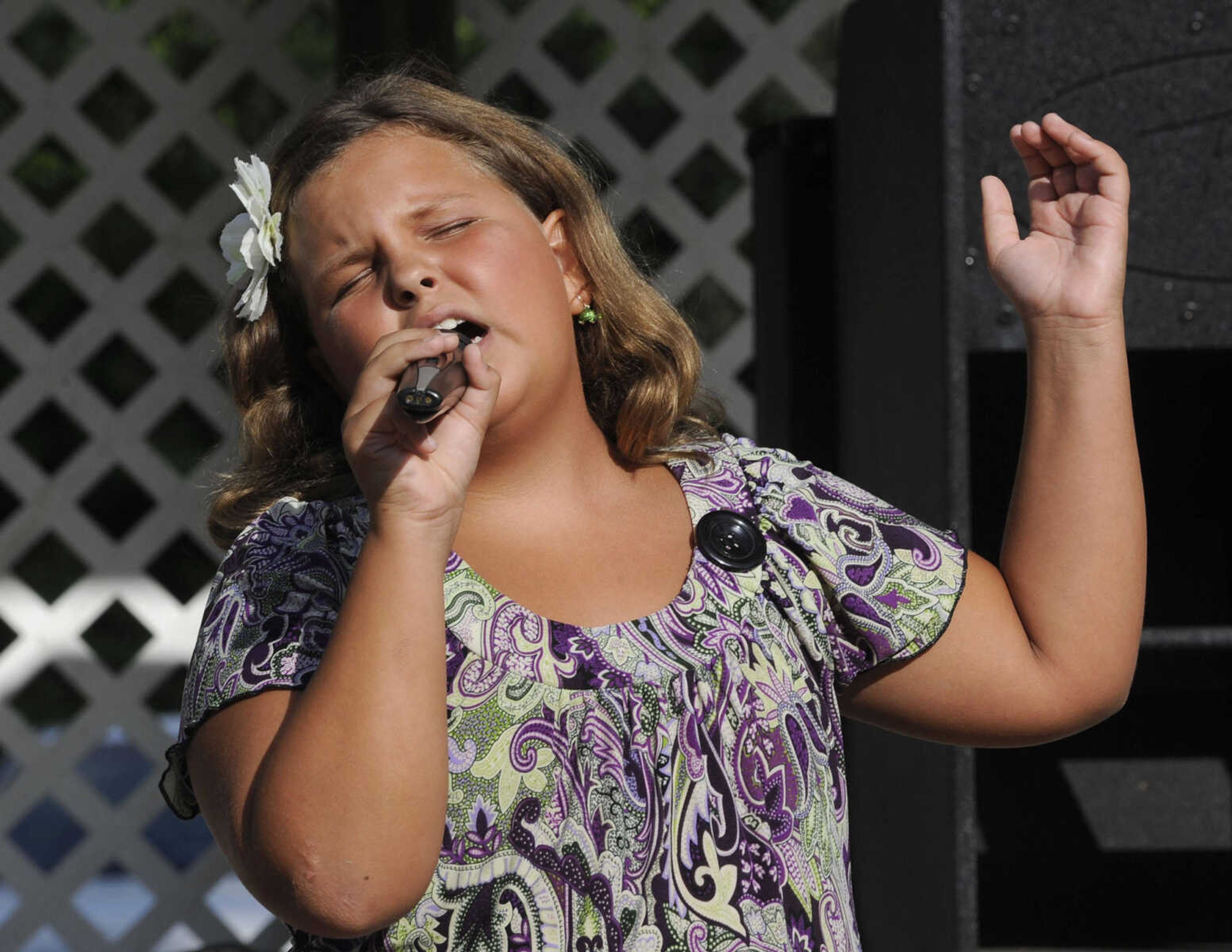 FRED LYNCH ~ flynch@semissourian.com
Ella Leible performs "Rolling in the Deep" in the Heartland Talent Showcase at German Days on Saturday, Aug. 9, 2014 at Frisco Park in Chaffee, Missouri.