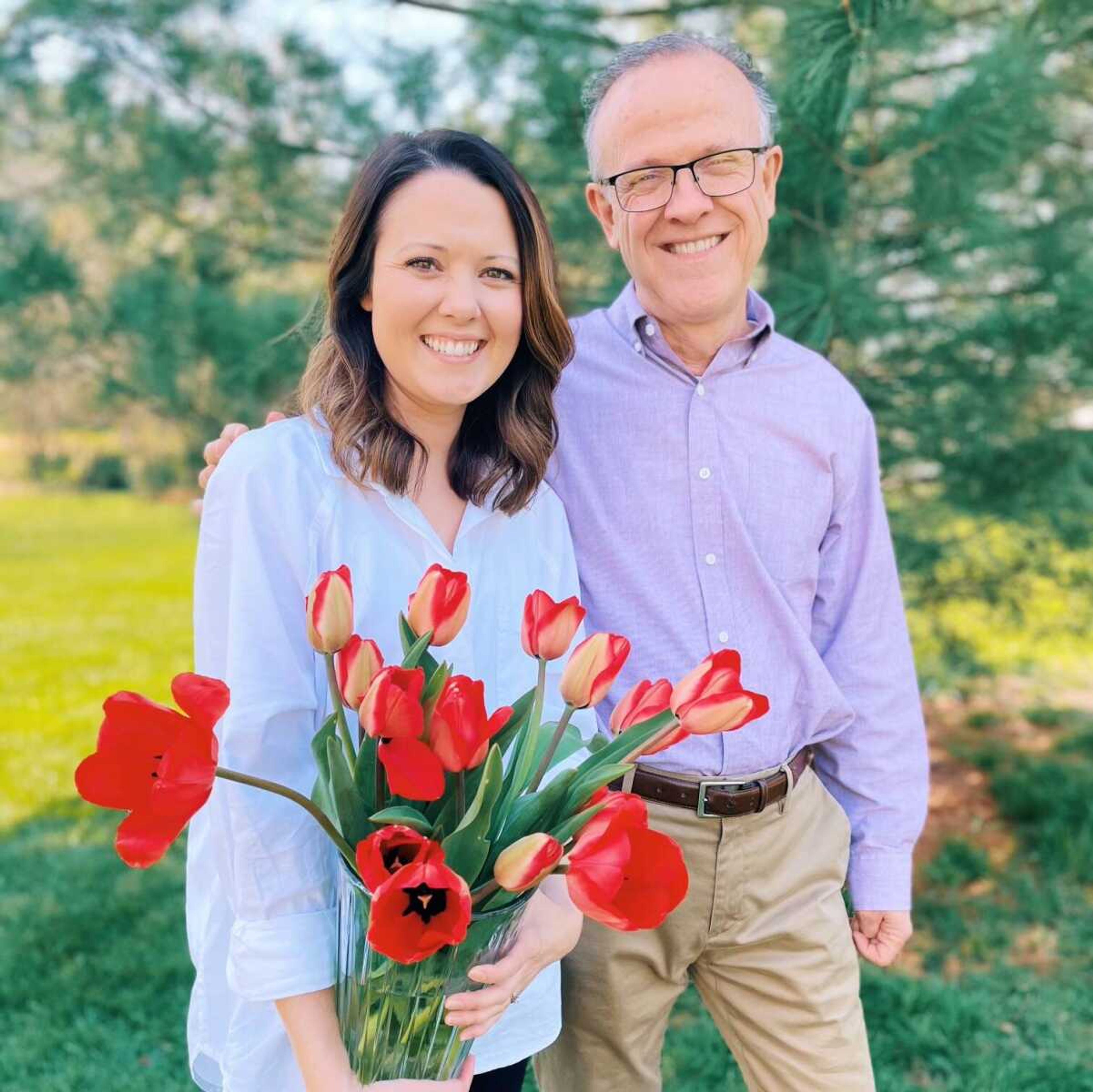 Rev. Ron Watts stands with his daughter Stephanie Heffner. The father-daughter duo works together to create bouquets and arrangements for their business Ferrari Flowers. 