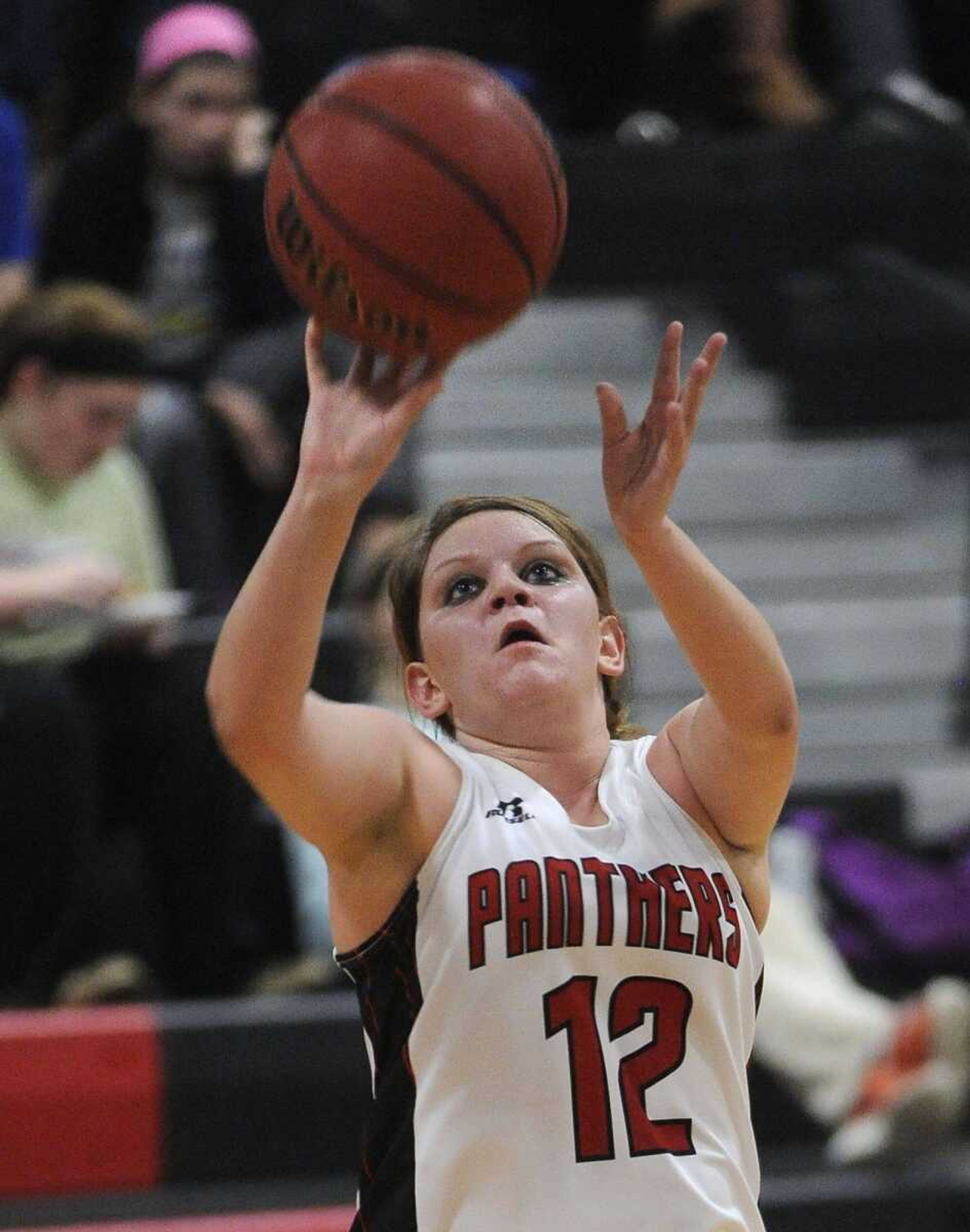 Meadow Heights  Abi Bristow takes a shot against St. Vincent during the first quarter Monday, Dec. 15, 2014 at Meadow Heights High School. (Fred Lynch)