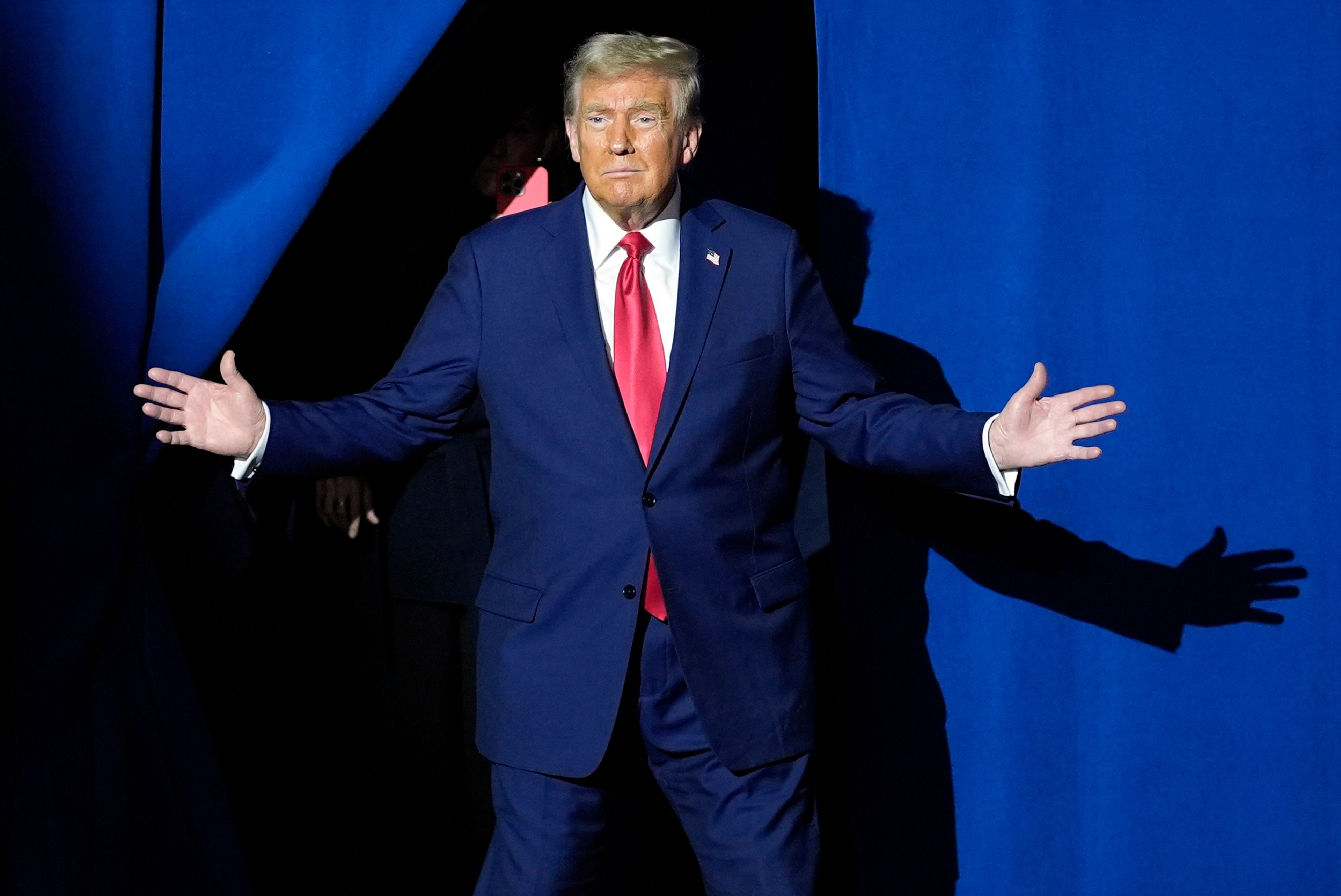 Republican presidential nominee former President Donald Trump arrives for a town hall at Lancaster County Convention Center, Sunday, Oct. 20, 2024, in Lancaster, Pa. (AP Photo/Evan Vucci)