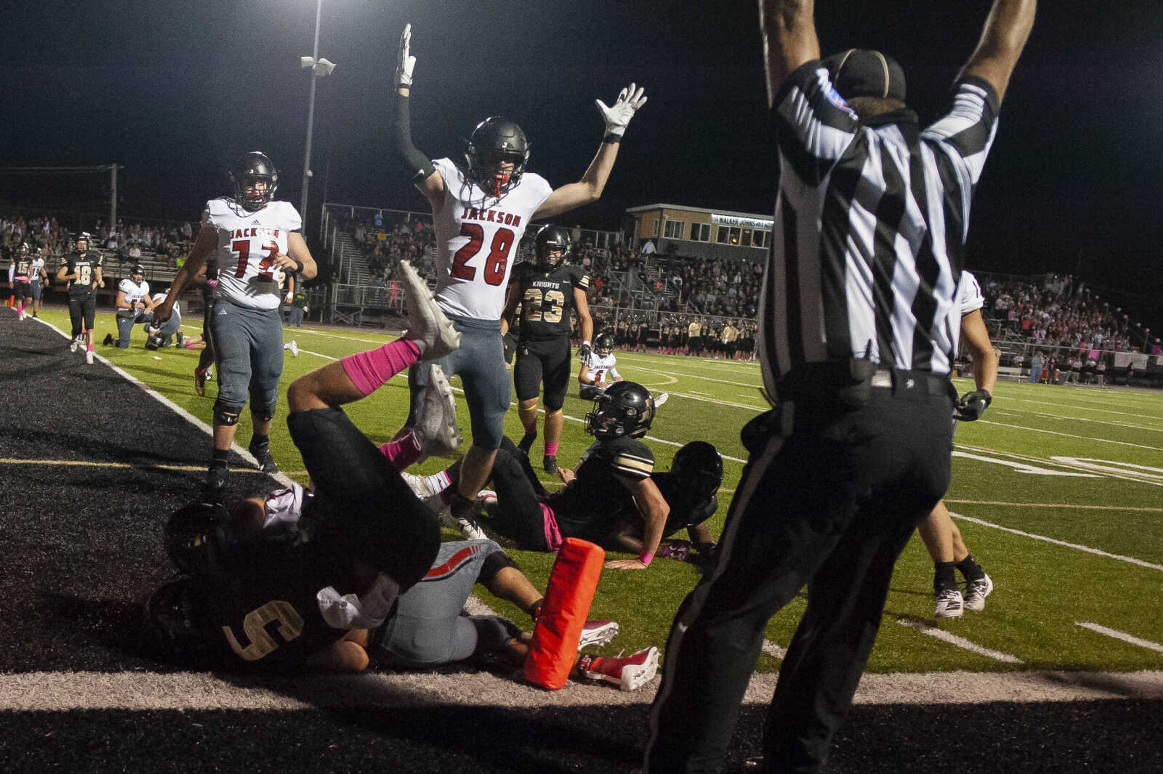 Jackson's Ty Moran (28) celebrates a touchdown during the Jackson Indians' 35-14 victory over Farmington on Friday, Oct. 4, 2019, in Farmington, Missouri.