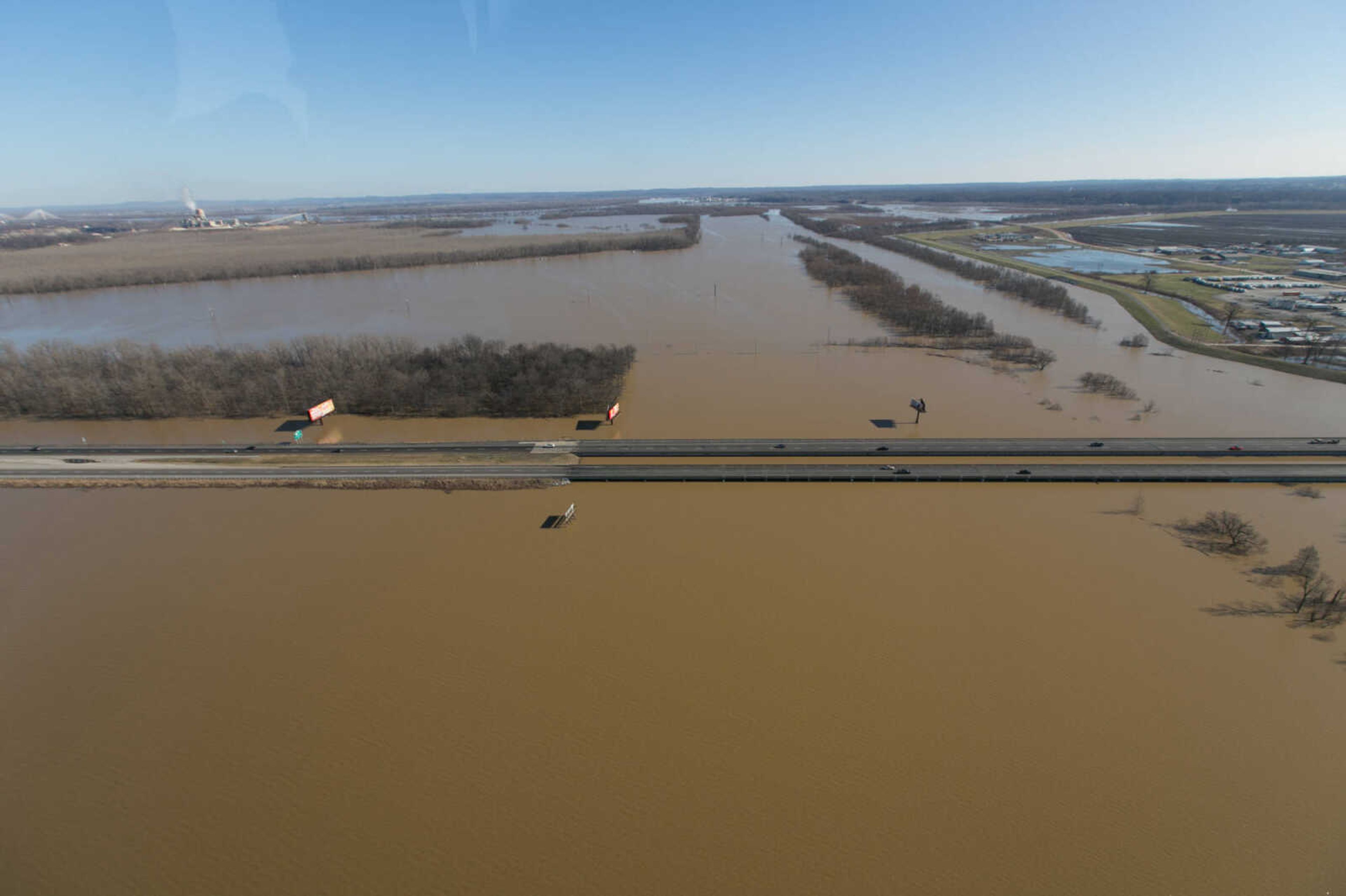 GLENN LANDBERG ~ glandberg@semissourian.com

Floodwater from the Diversion Channel spreads across the horizon near Cape Girardeau, Saturday, Jan. 2, 2016.