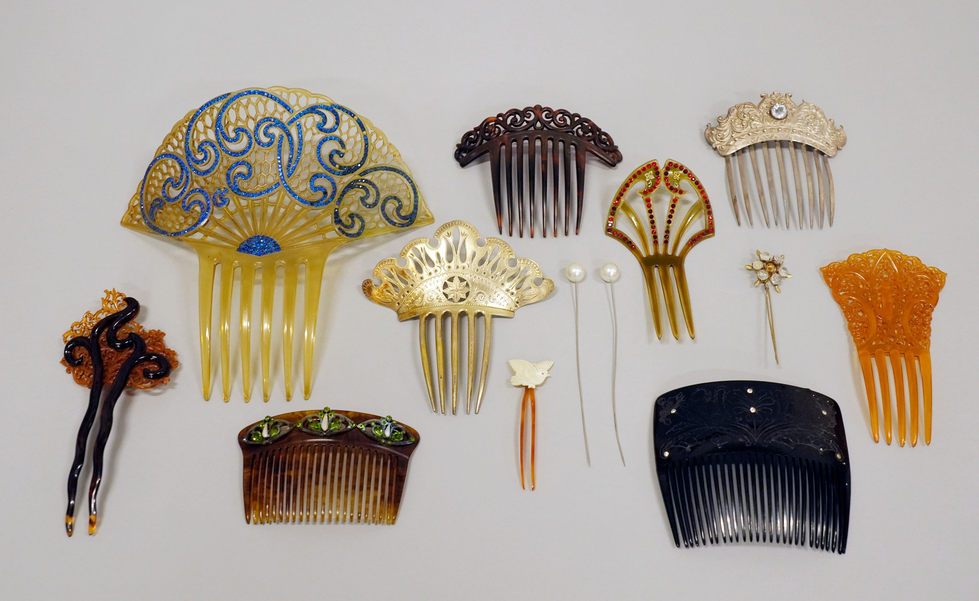 A collection of hair pins and combs from the 1993 film "The Age of Innocence" is pictured on Tuesday, Oct. 29, 2024, at the Pickford Center for Motion Picture Study in Los Angeles. (AP Photo/Chris Pizzello)