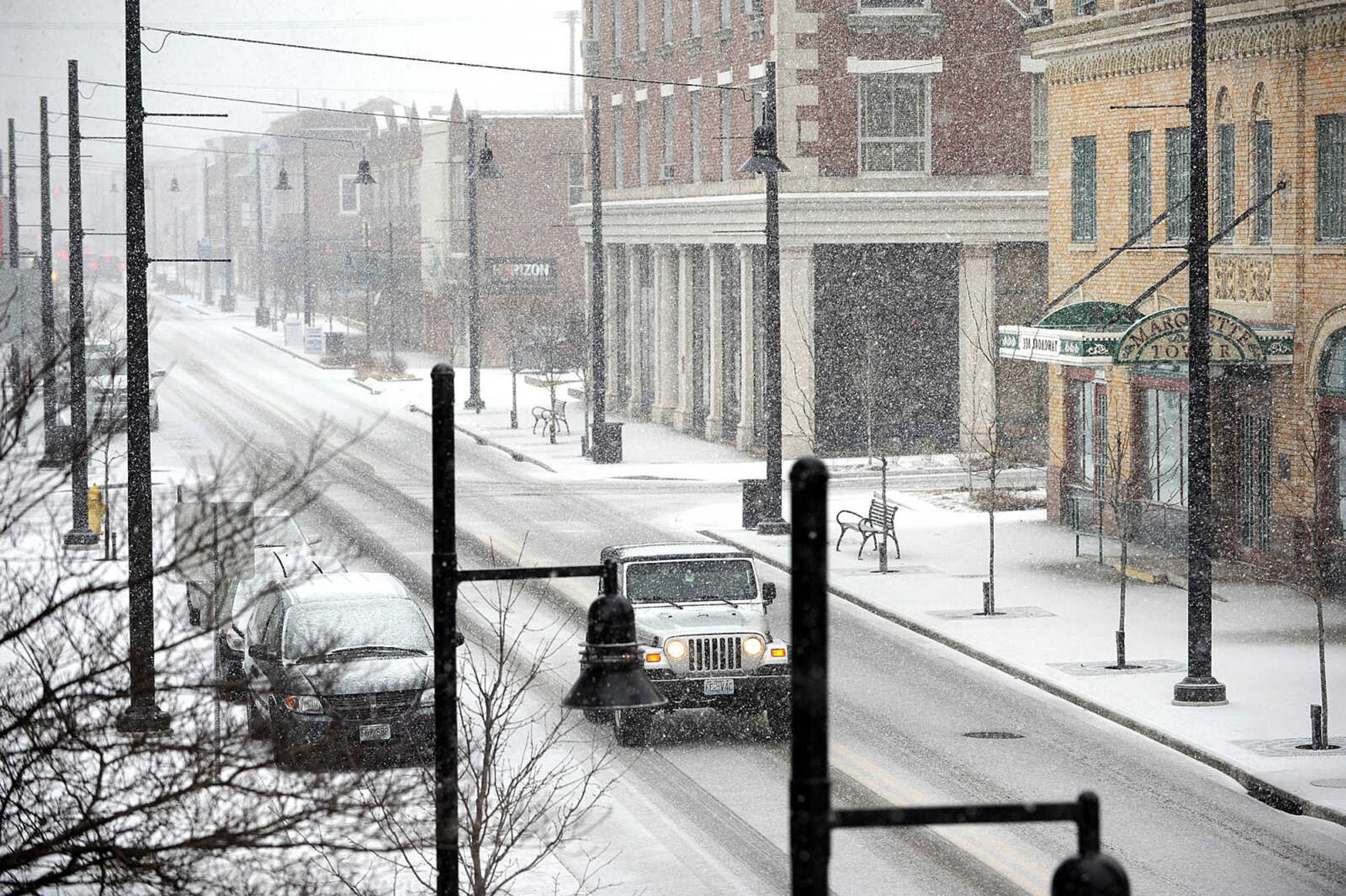 LAURA SIMON ~ lsimon@semissourian.com

Snow blankets Broadway for a wintery scene, Tuesday afternoon, Feb. 4, 2014. A winter storm warning remains in effect for Bollinger, Butler, Cape Girardeau, Carter, Mississippi, New Madrid, Perry, Ripley, Scott, Stoddard and Wayne Counties until 6 a.m. Wednesday.