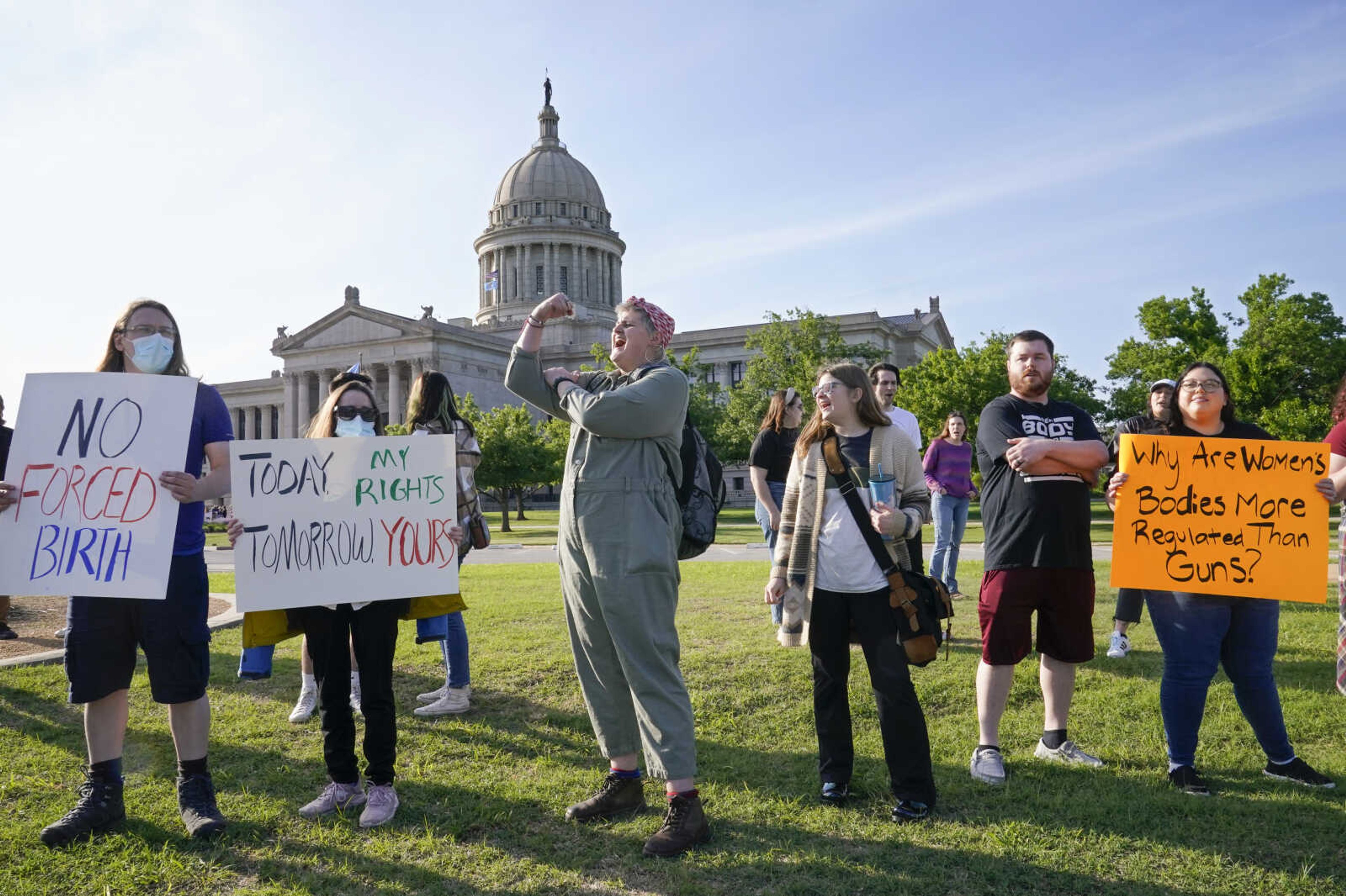 Abortion-rights supporters rally at the State Capitol on May 3 in Oklahoma City. A divided Oklahoma Supreme Court on Tuesday overturned a portion of the state's near total ban on abortion, ruling women have a right to abortion when pregnancy risks their health, not just in a medical emergency.